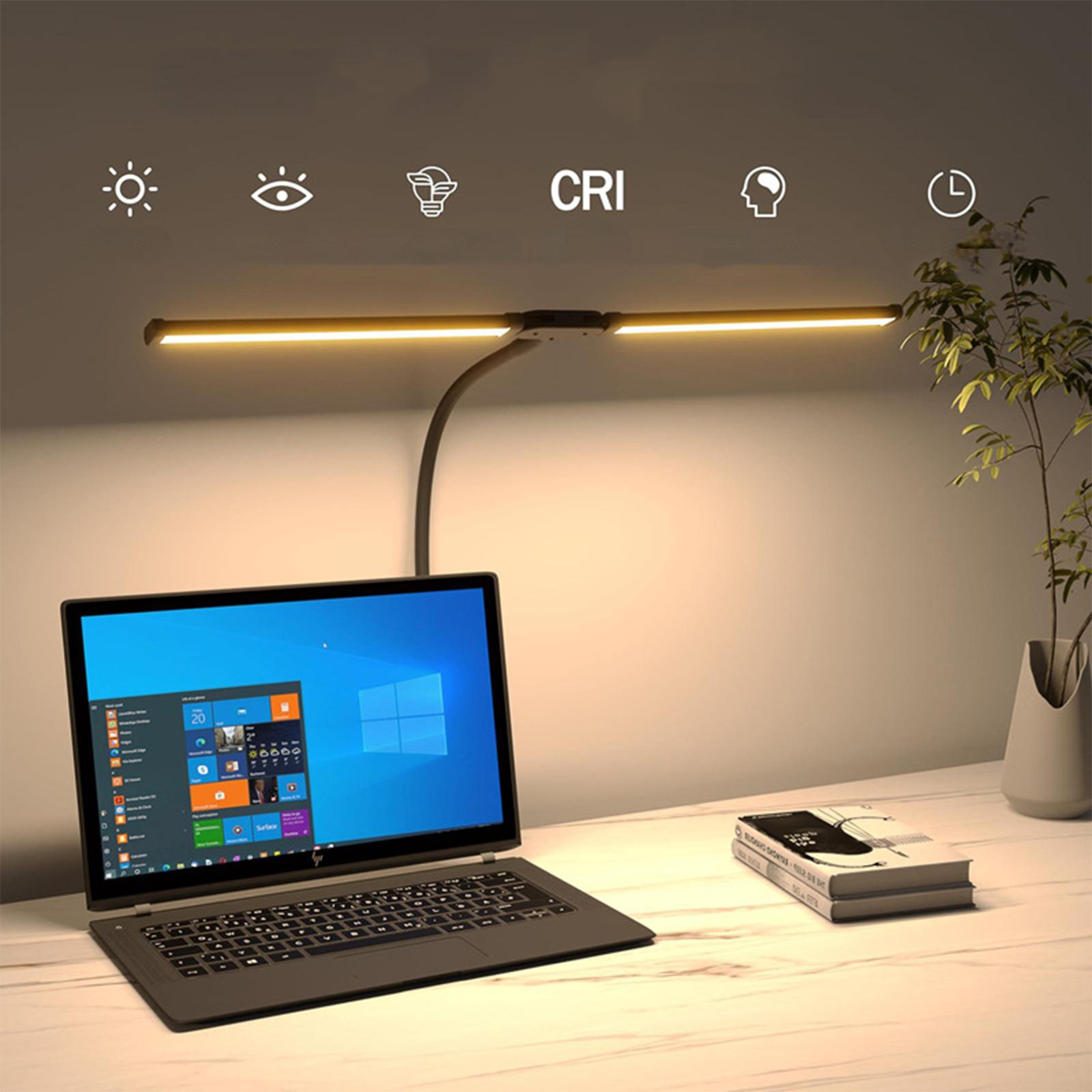 Ein Schreibtisch mit Laptop unter einer Schreibtischlampe. Es gibt Symbole für Sonne, Auge, Birne, CRI und Zeit.