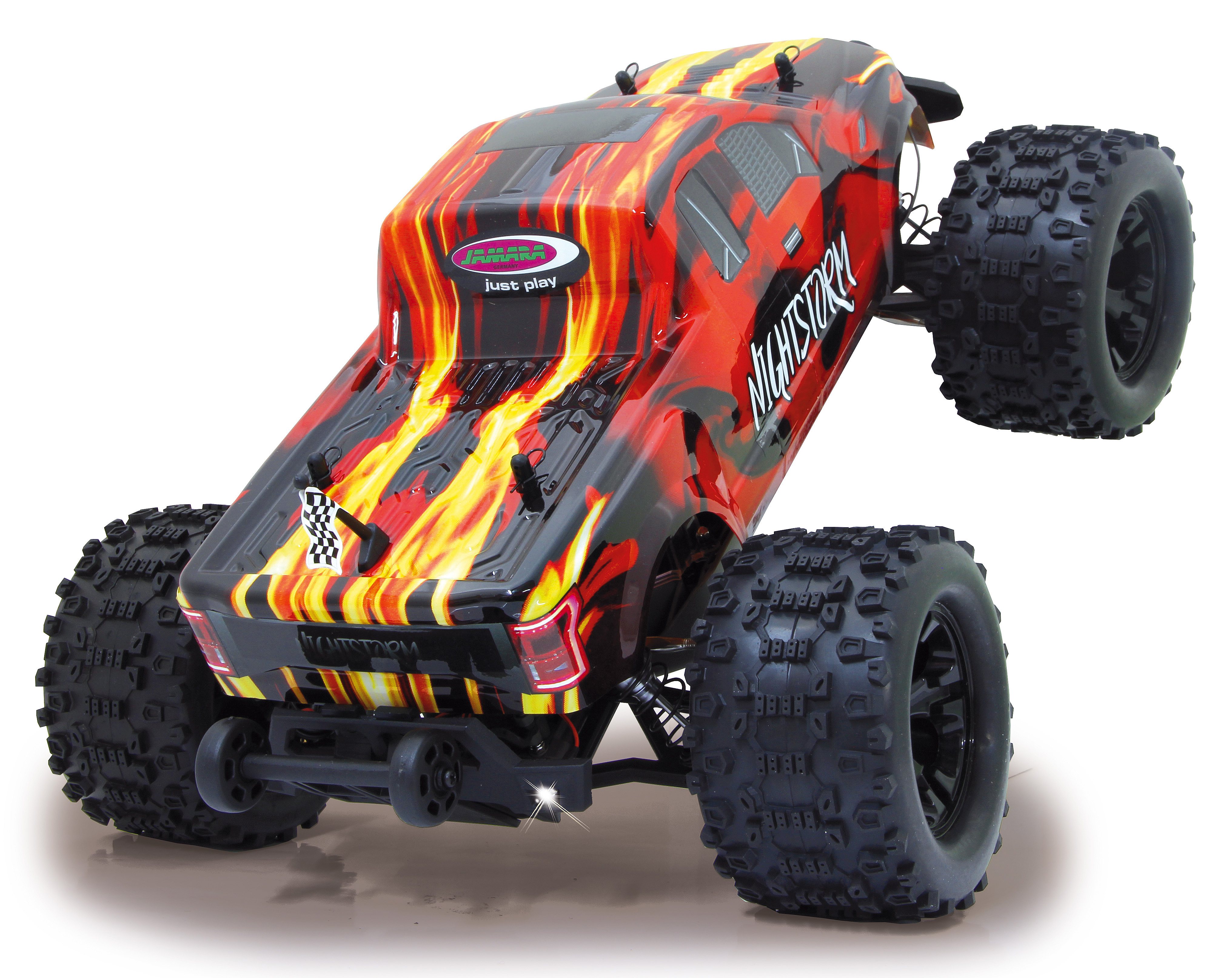 Draufsicht auf ein rotes und schwarzes Monstertruck-Spielzeug. Die Worte NIGHTSTORM und Just Play.