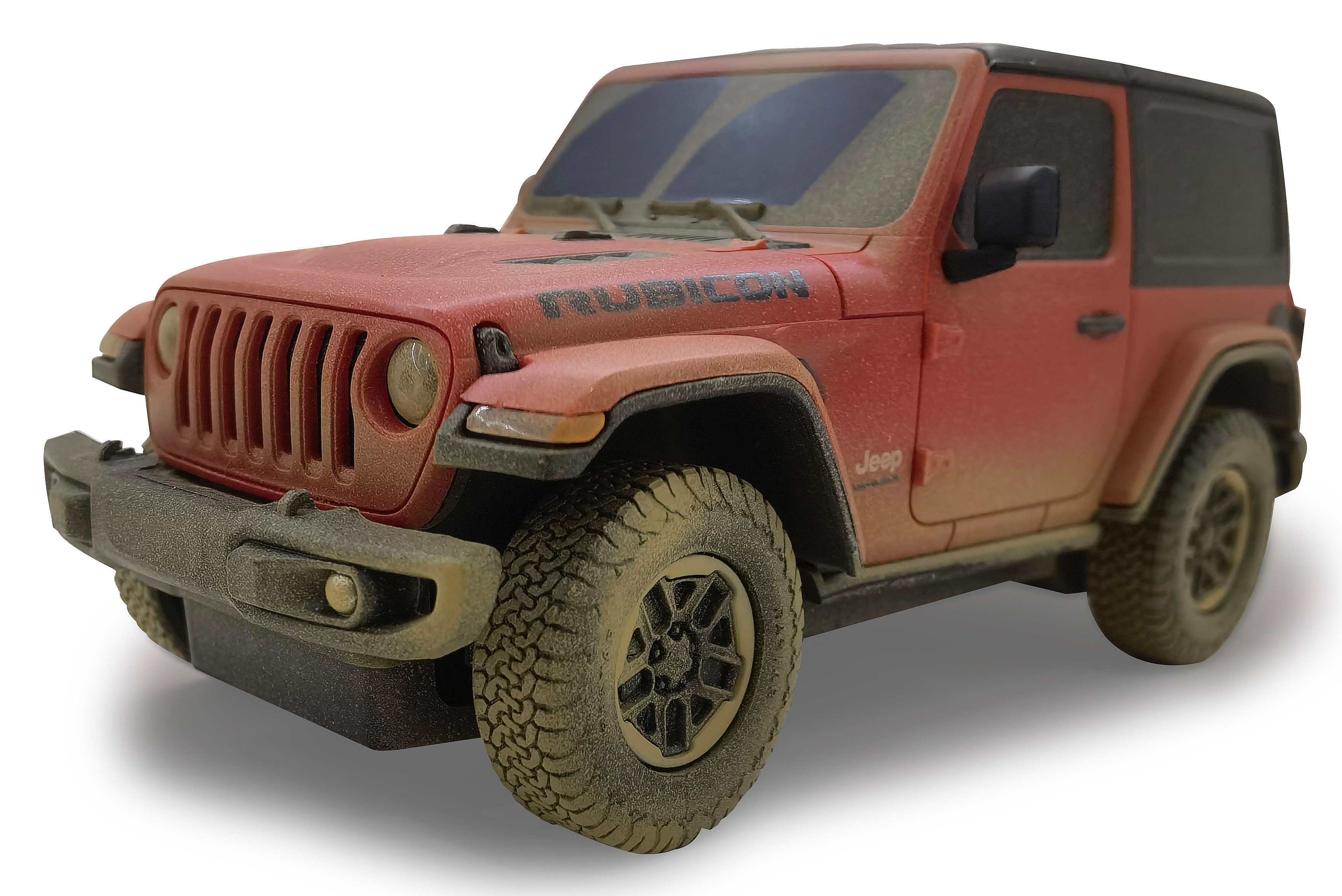 Eine schräge Ansicht eines roten Jeep-Spielzeugautos mit schwarzem Dach. Die Räder sind schmutzig.