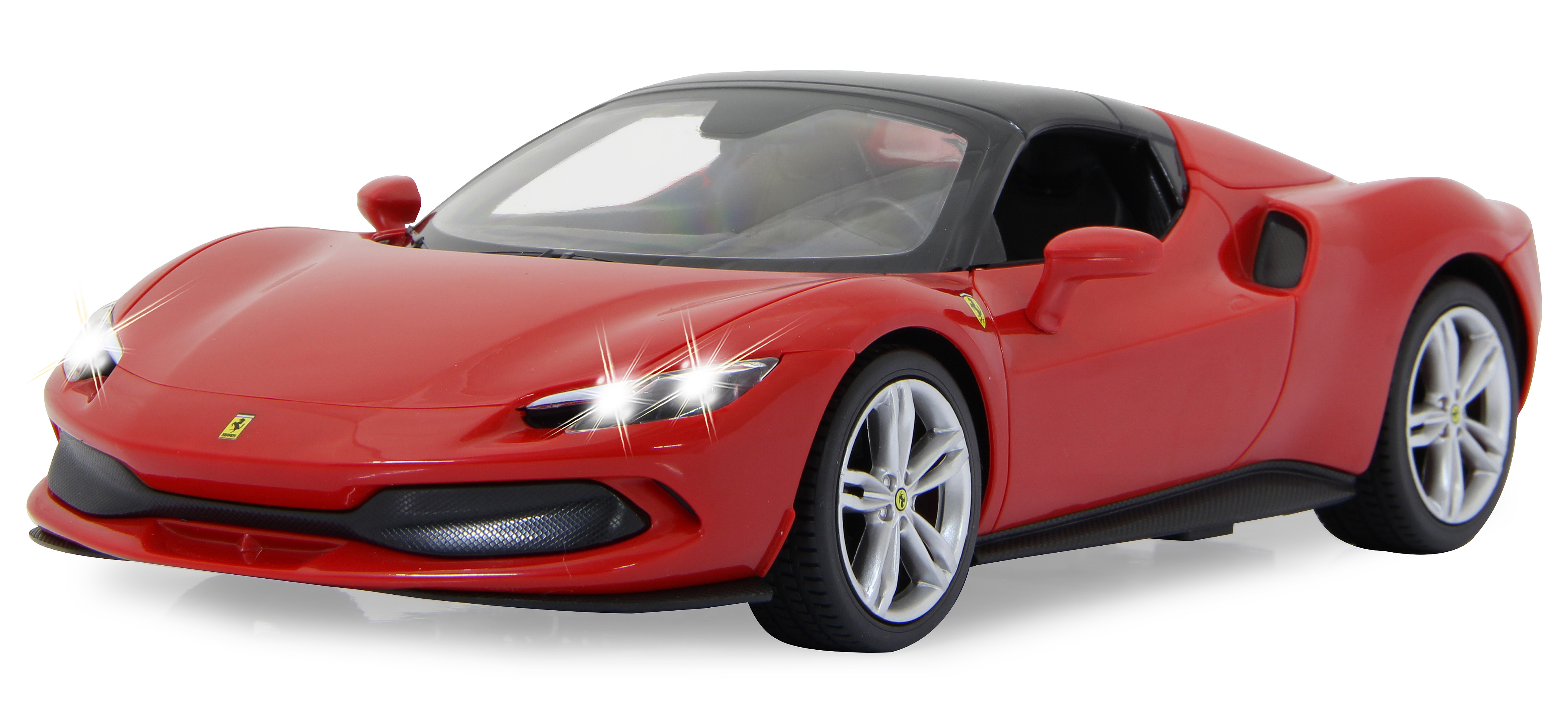 Rotes Ferrari-Sportwagen-Spielzeug mit eingeschalteten Lichtern. Weißer Hintergrund.