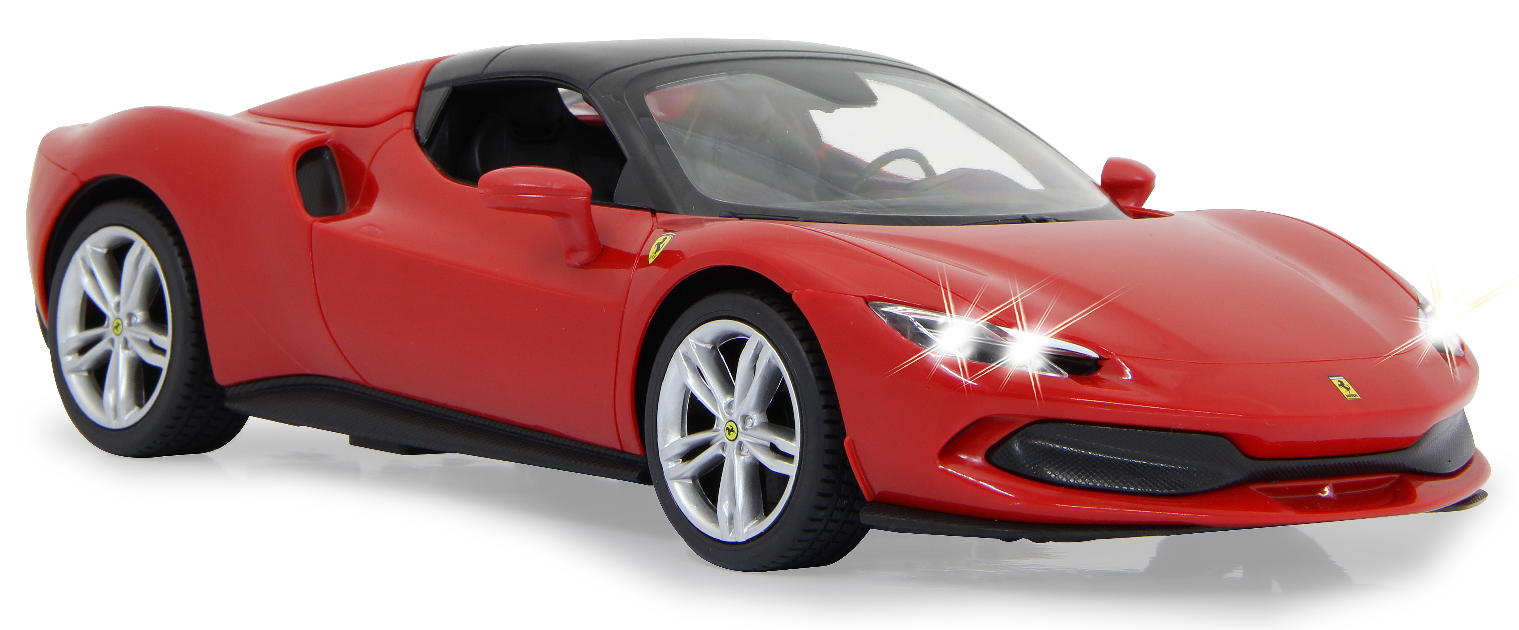 Rotes Ferrari-Sportwagen-Spielzeug mit Lichtern und schwarzem Dach. Weißer Hintergrund.