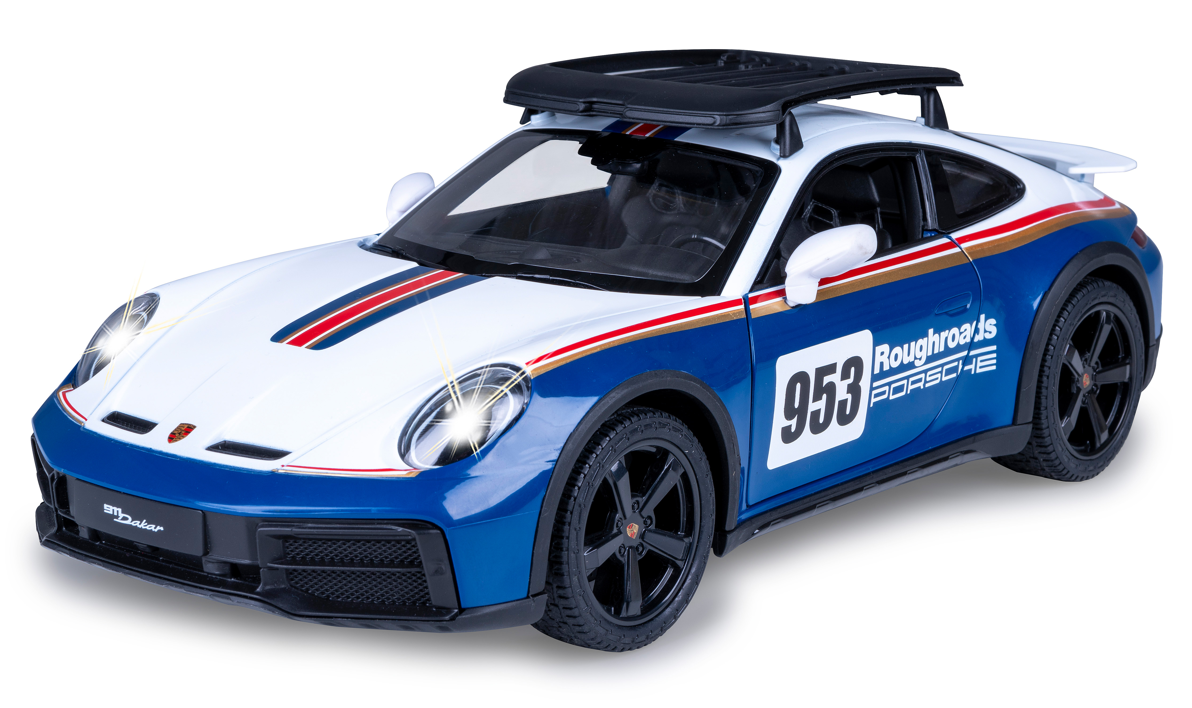 Ein Spielzeug-Porsche 911 Dakar, blau und weiß, mit eingeschalteten Scheinwerfern. Er hat einen Dachgepäckträger.