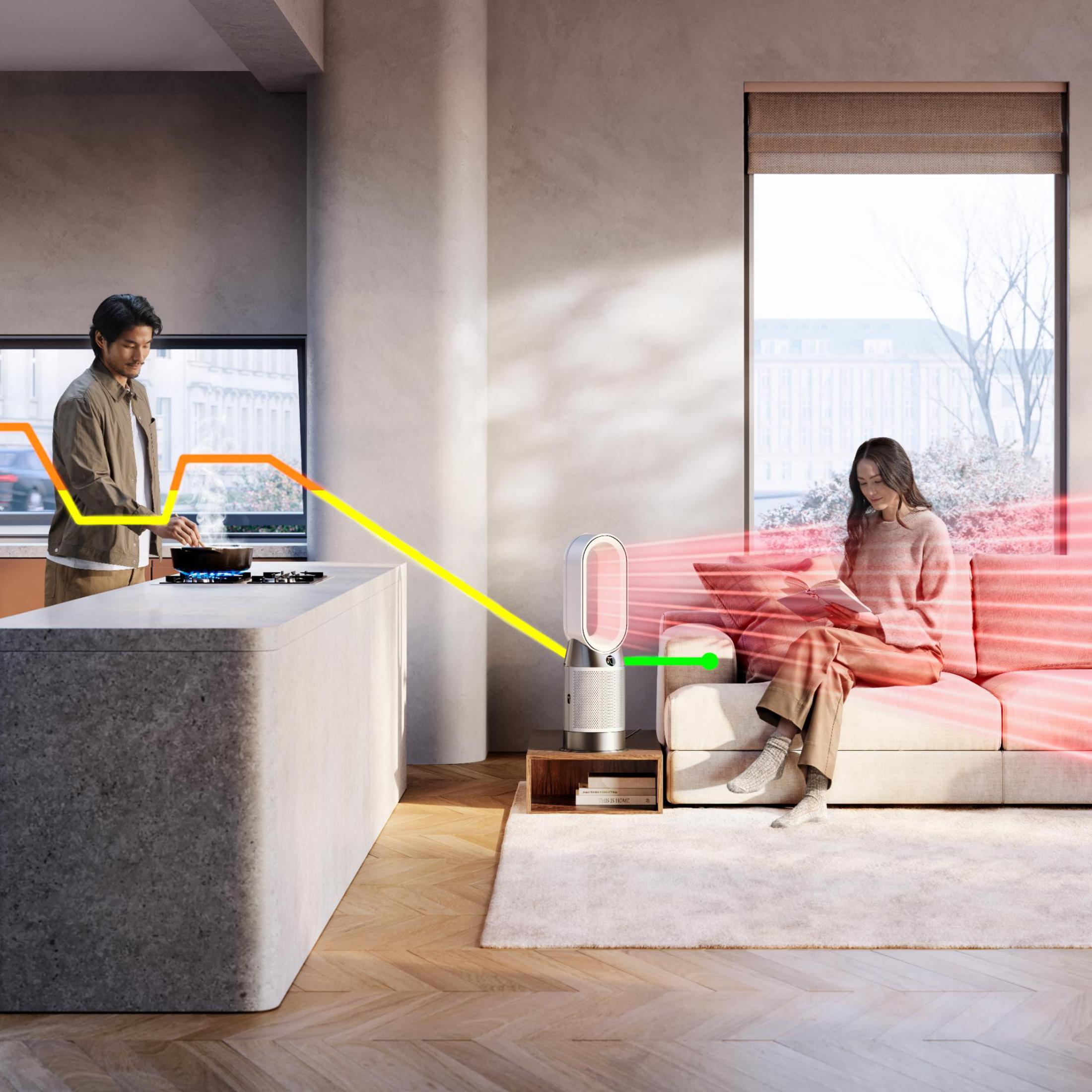 Escena de sala de estar: Persona cocinando, otra leyendo cerca de un ventilador Dyson. Línea roja de flujo de aire.