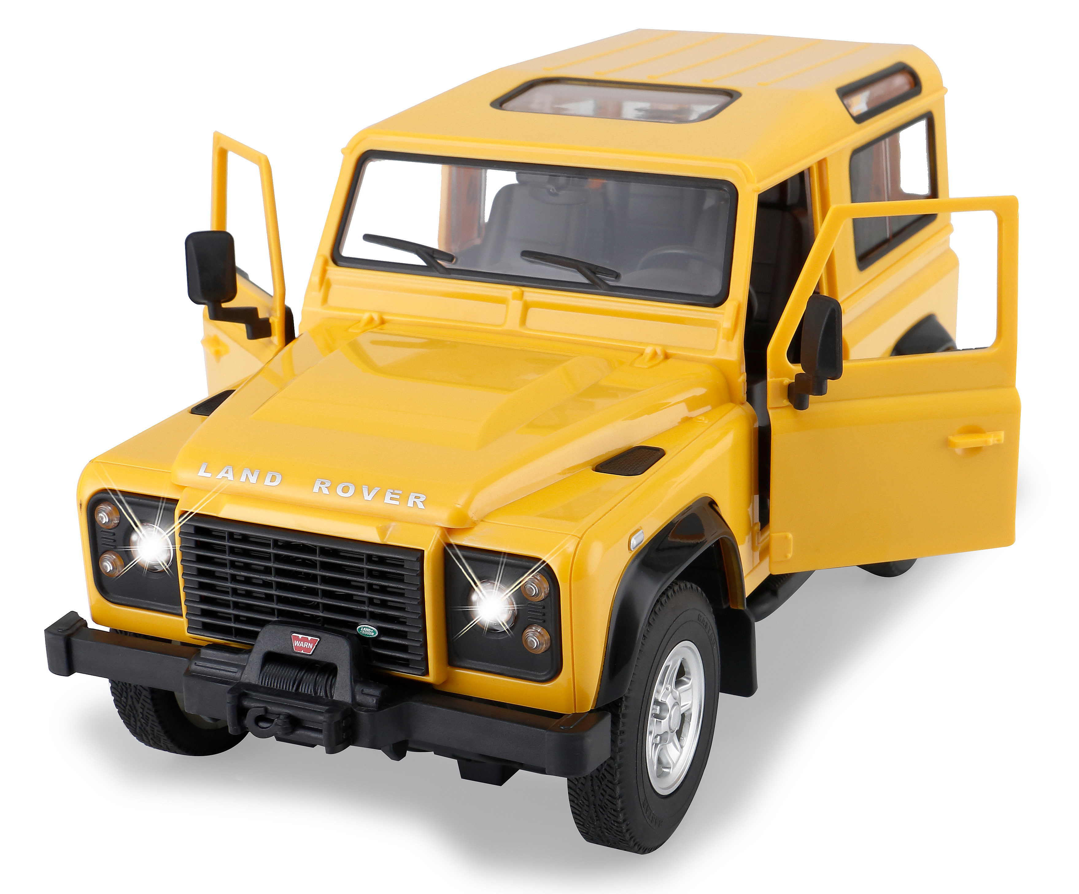 Gelbes Land Rover Defender Spielzeugauto mit eingeschalteten Scheinwerfern.