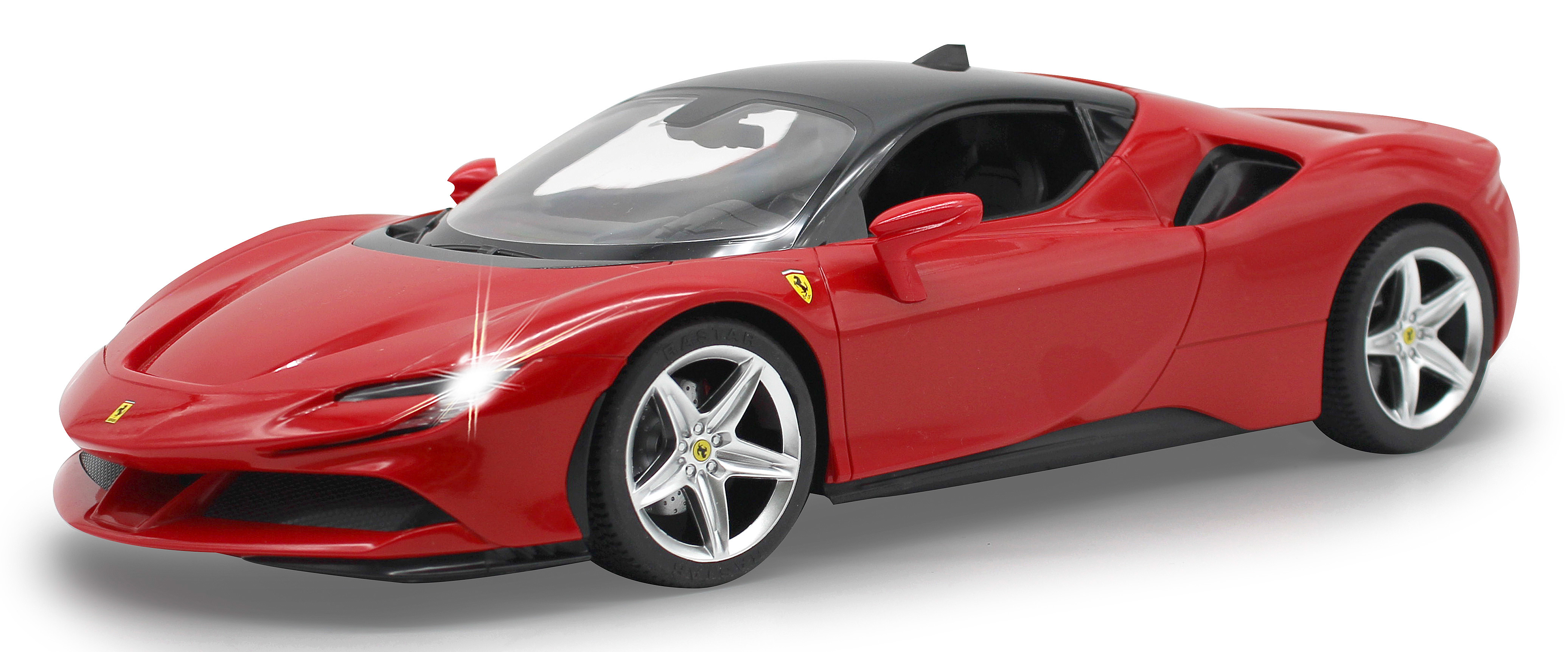 Rotes Ferrari-Spielzeugauto mit schwarzem Dach. Das Auto hat seine Scheinwerfer an.