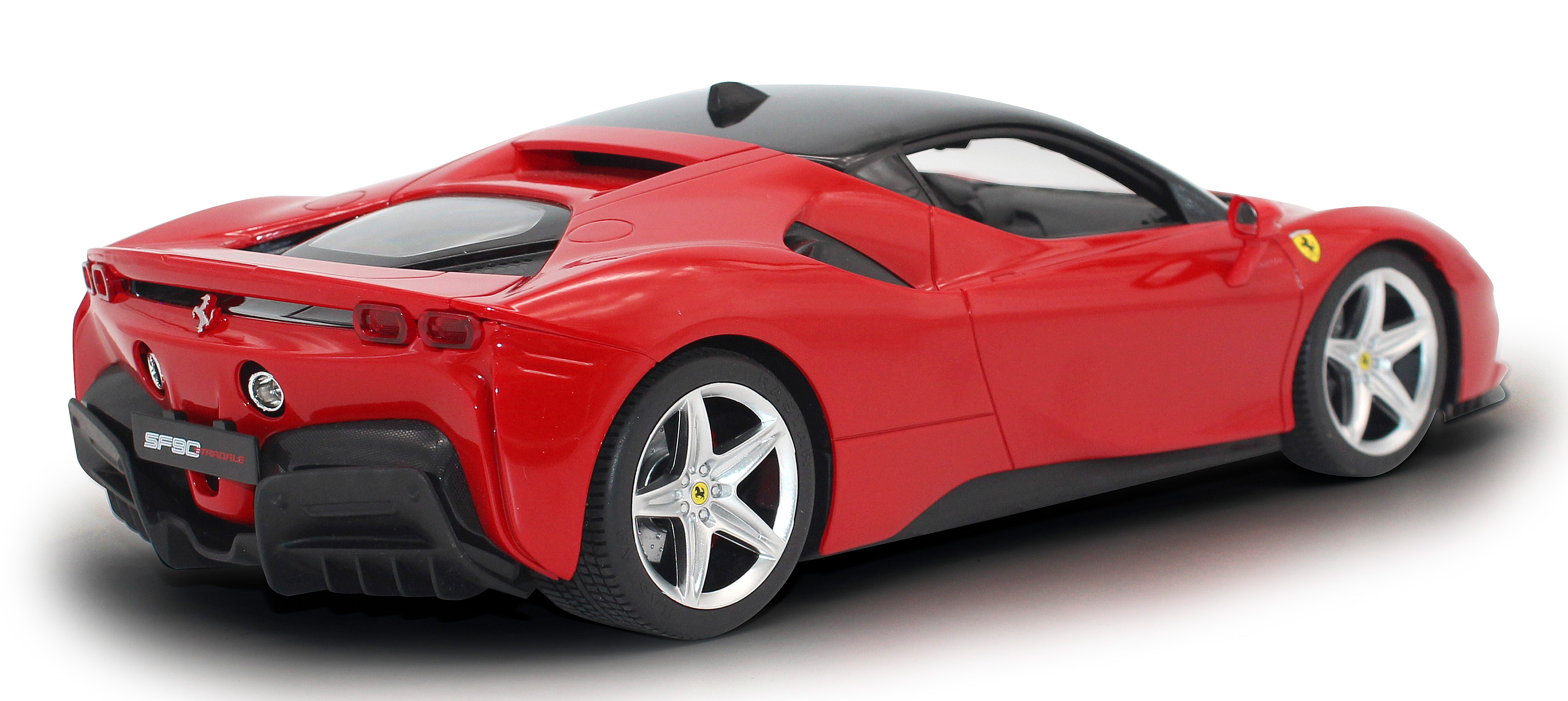 Rotes Ferrari-Spielzeugauto, Rückansicht. Das Auto hat ein schwarzes Dach.