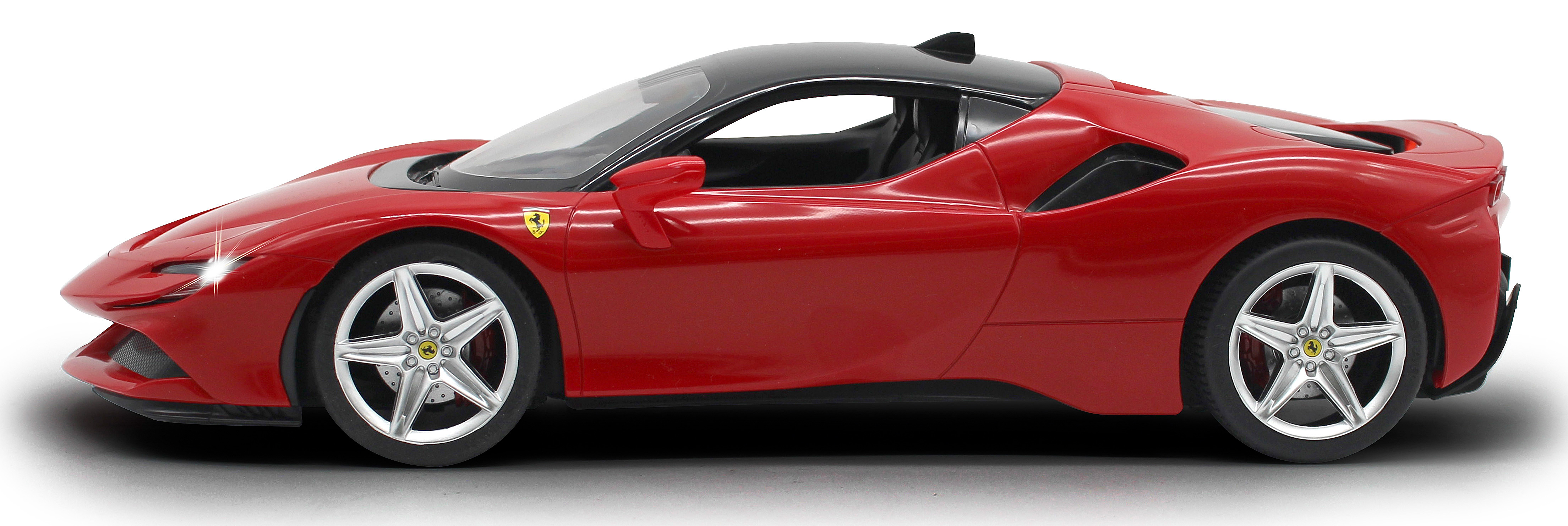 Rotes Ferrari-Spielzeugauto mit schwarzem Dach. Das Auto steht auf weißem Untergrund.
