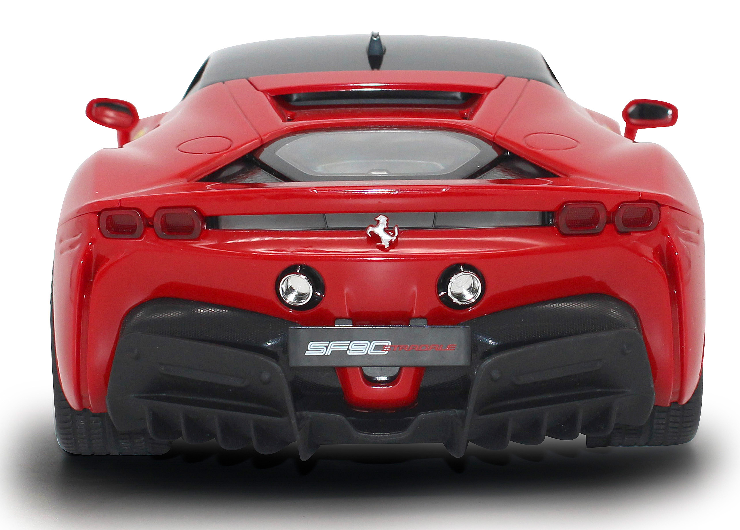 Rotes Ferrari-Spielzeugauto, Rückansicht. Das Auto hat ein schwarzes Dach.
