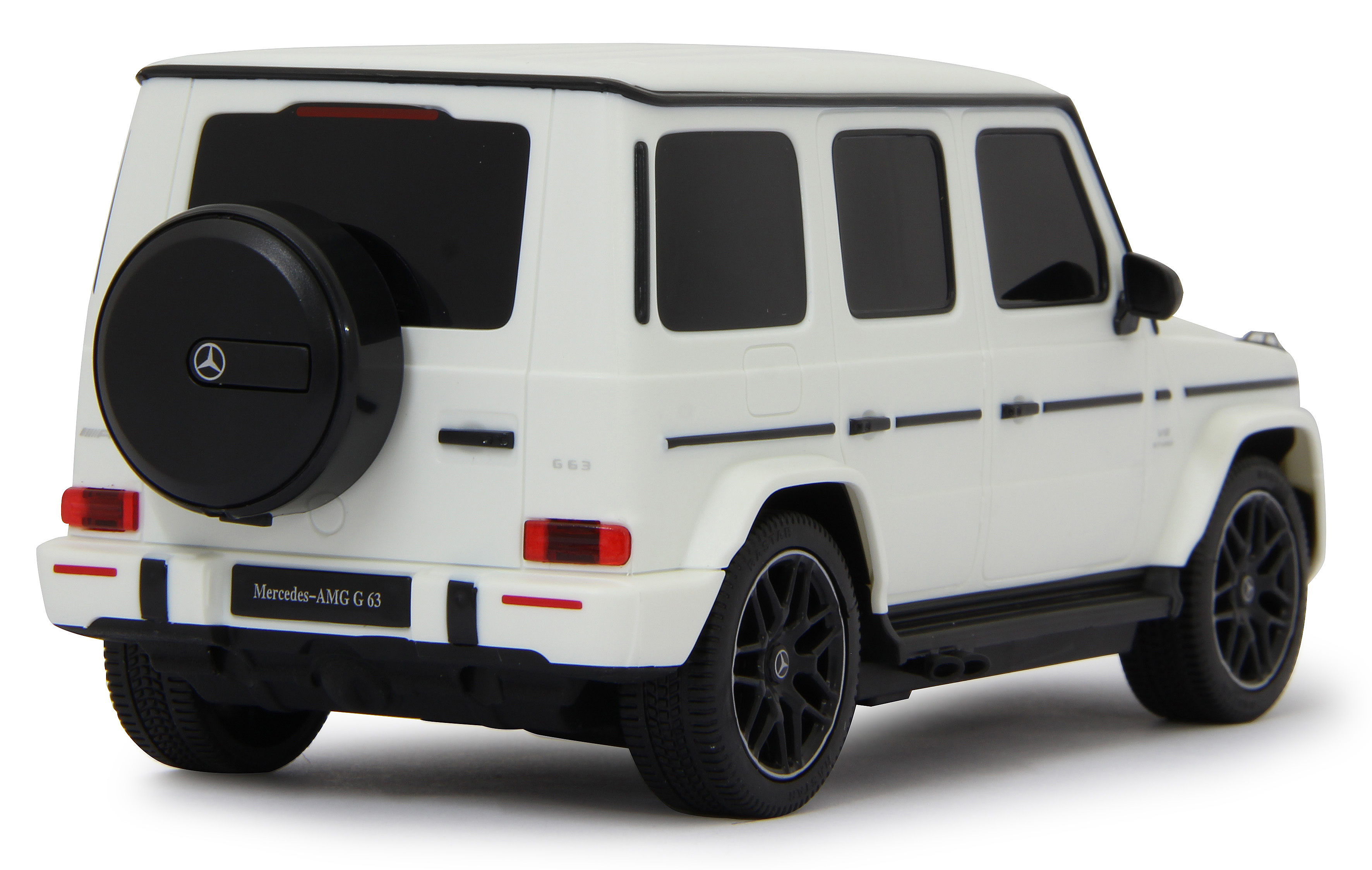 Weißes Mercedes-Benz G-Klasse Spielzeugauto mit schwarzen Rädern, einem Ersatzreifen und schwarzen Fenstern.