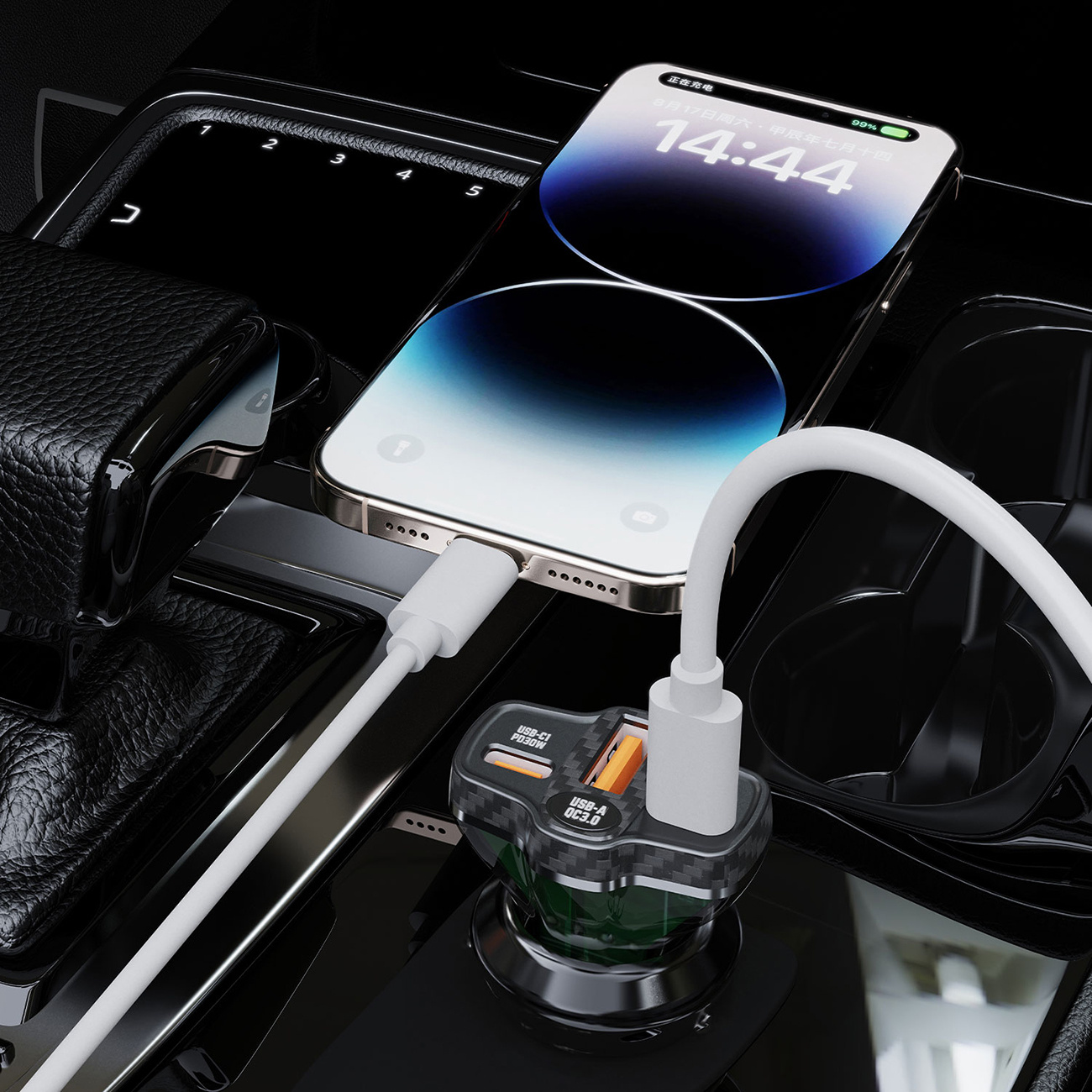 Telefon ładujący się w samochodzie, z ładowarką i białym kablem, pokazuje godzinę 14:44 na ekranie.