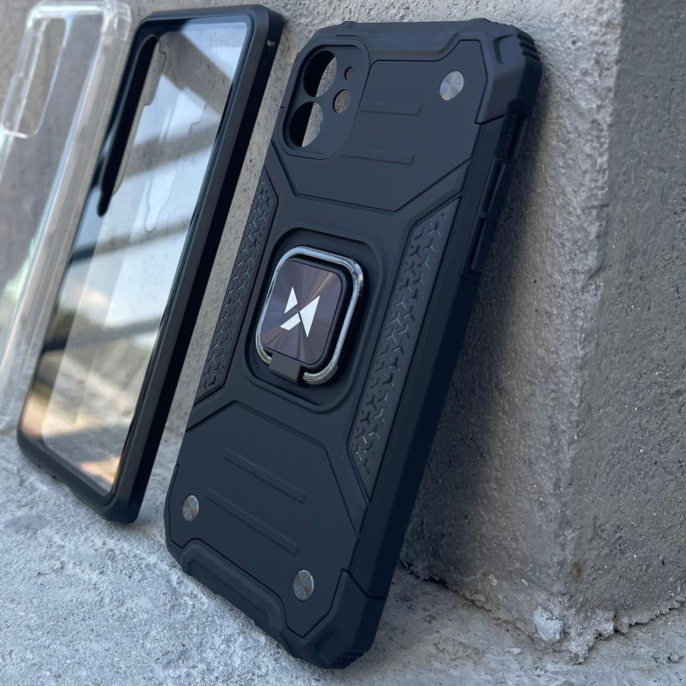 Czarne etui na telefon z uchwytem na pierścień, oparte o ścianę. Obok przezroczyste etui.