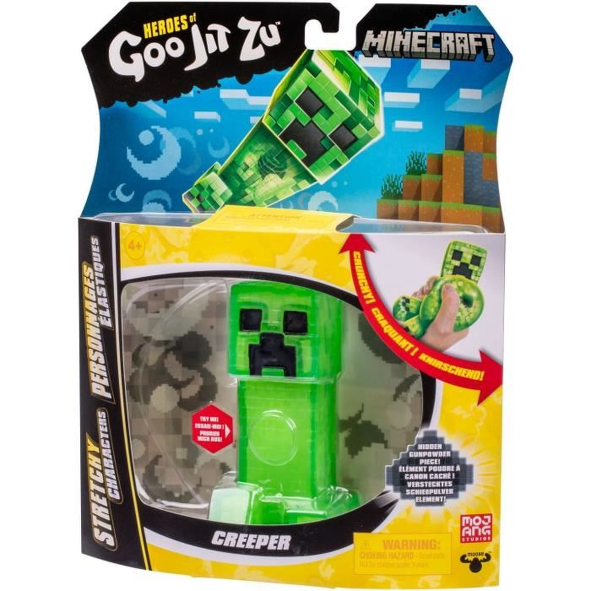 Un juguete Creeper en una caja. El empaque muestra el juguete y el logo de Minecraft.