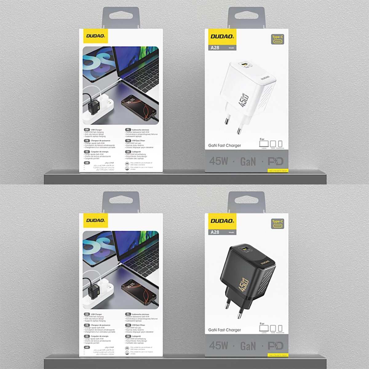 Cztery pudełka ładowarek na półce, dwa białe i dwa czarne.