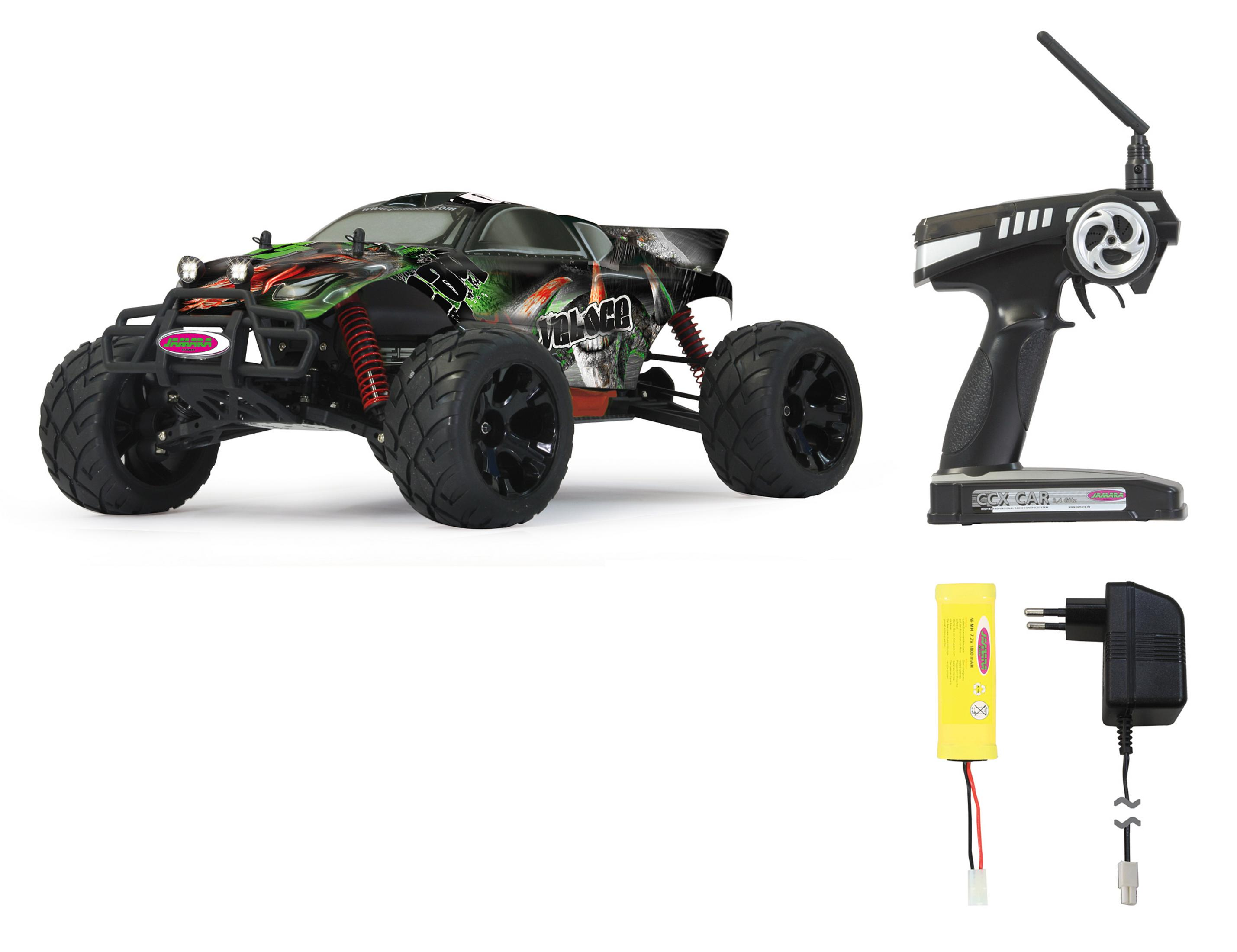 RC-Auto mit schwarz-grünem Design, Controller, Akku und Ladegerät auf weißem Hintergrund.