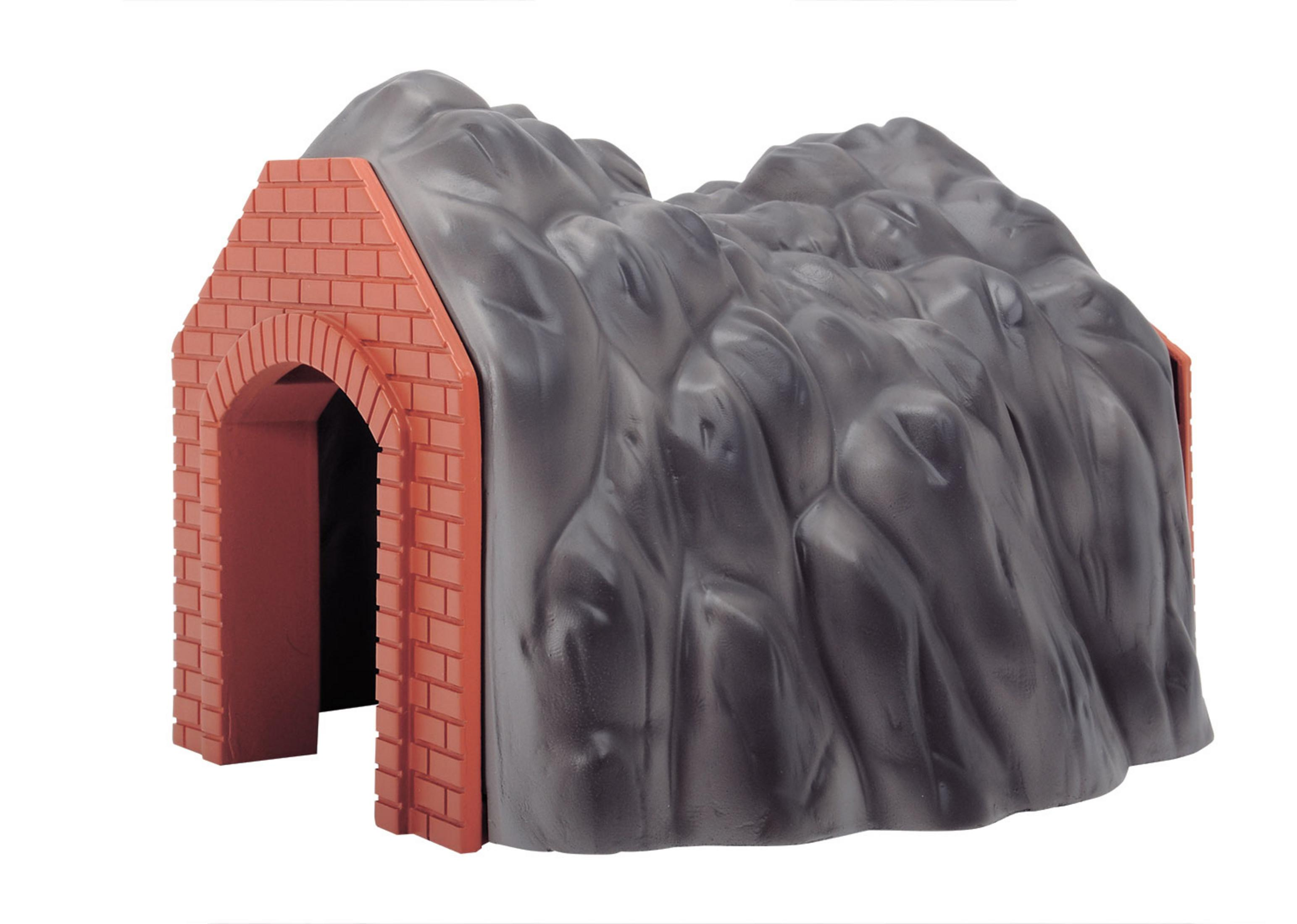 Ein Spielzeugtunnel aus Kunststoff. Er hat eine ziegelartige Fassade und eine graue Felsstruktur oben.