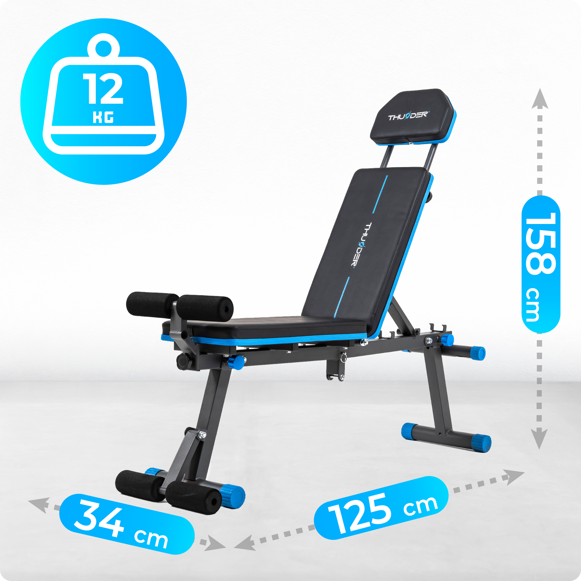 Regulowana ławka do ćwiczeń z niebieskimi akcentami. Wymiary są zaznaczone. Widoczna waga 12 kg.