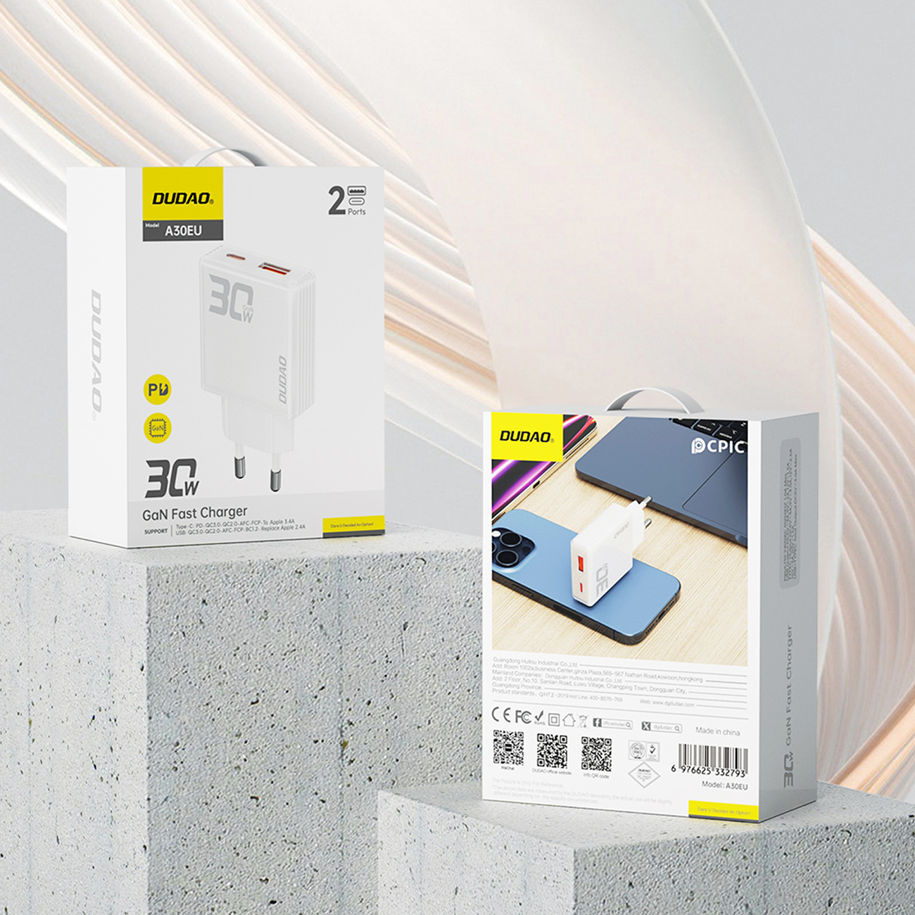 Dwa pudełka ładowarki Dudao, jedno z ładowarką i jedno z obrazem telefonu i ładowarki.