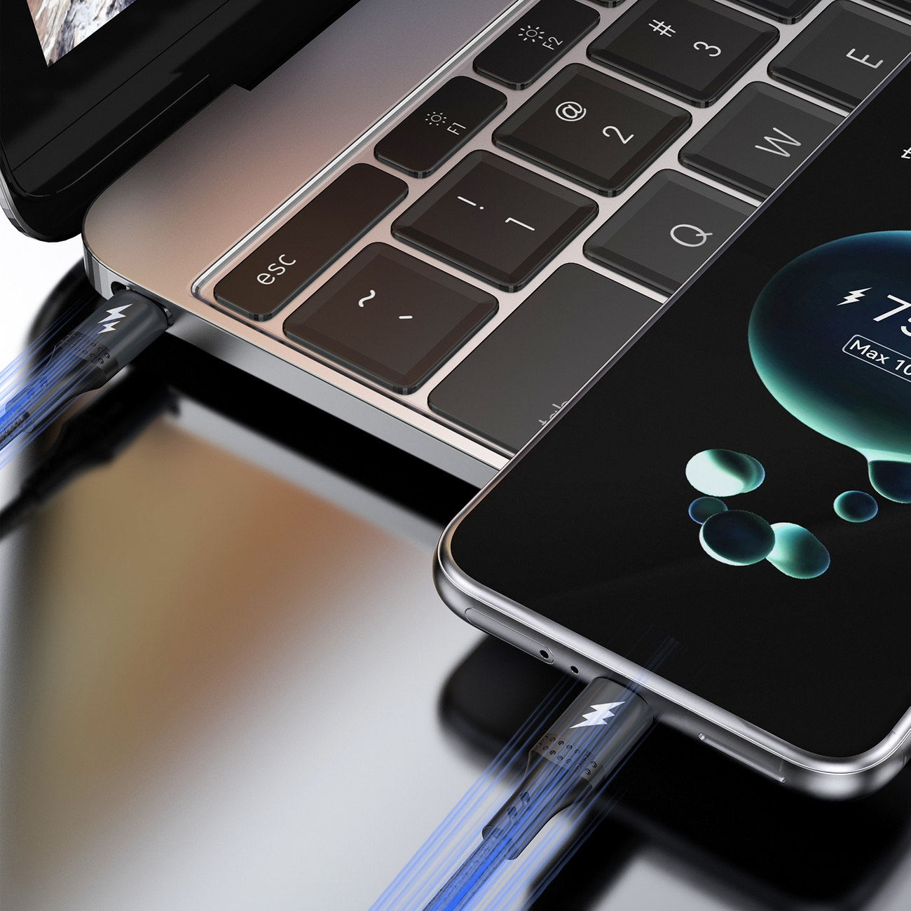 Telefon i laptop ładujące się za pomocą kabli USB, widoczne błyskawice elektryczne.