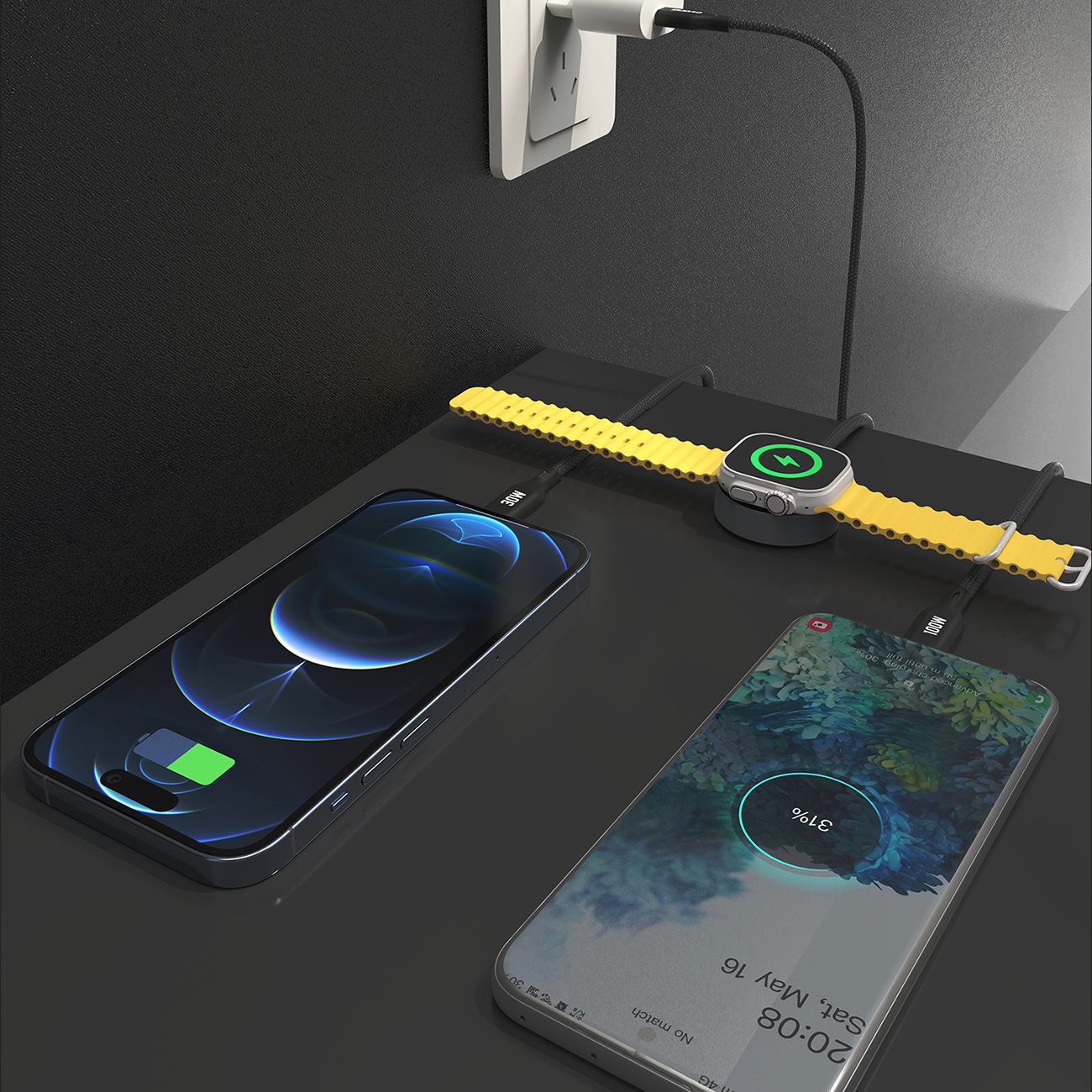 Wiele urządzeń ładujących się na czarnej powierzchni. Telefon, smartwatch i laptop są podłączone.