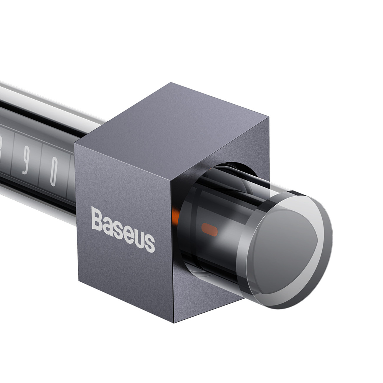 Szare urządzenie w kształcie kostki z przezroczystą, cylindryczną częścią. Widoczne logo Baseus.