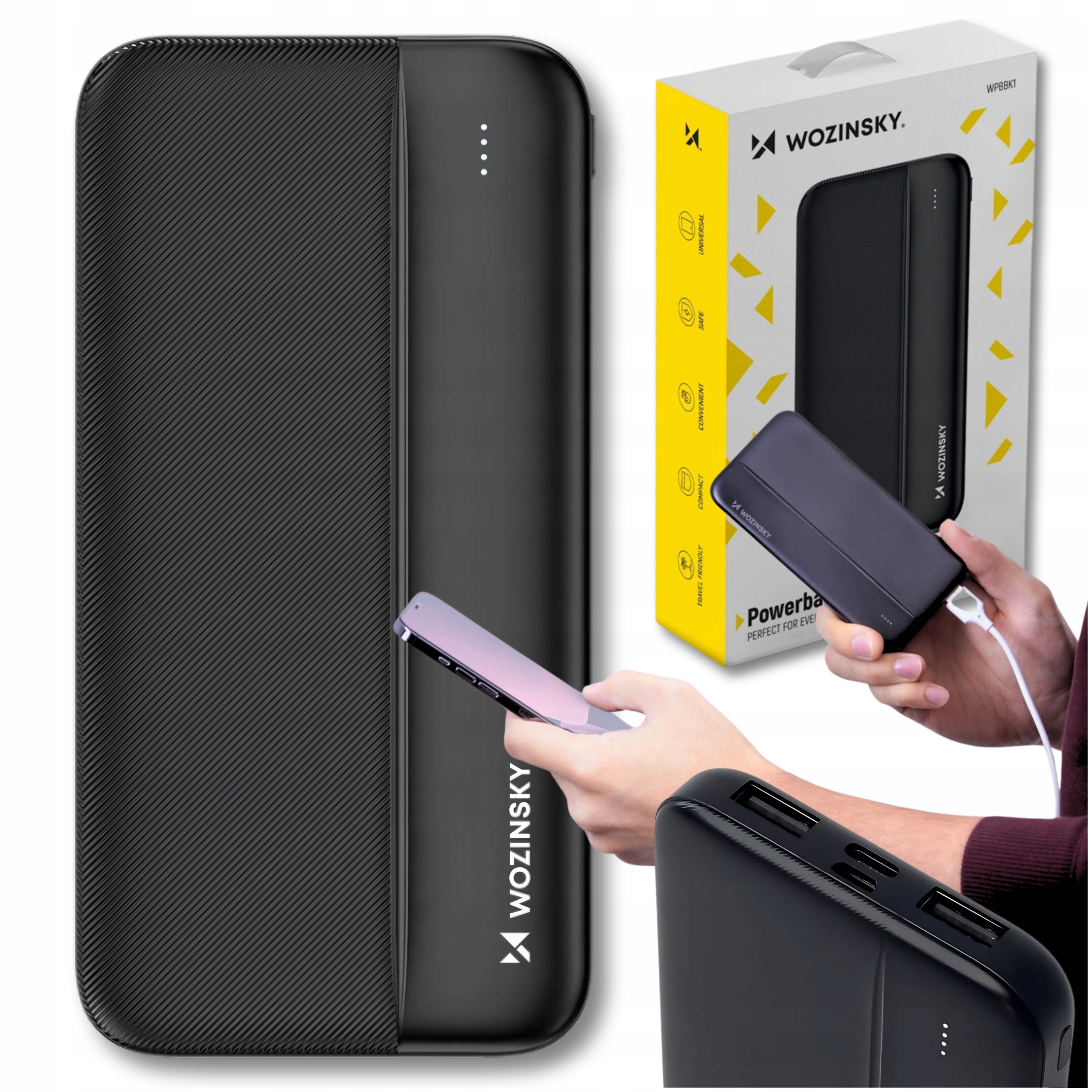 Power bank z telefonem i pudełkiem. Power bank jest czarny z teksturowanym wzorem.