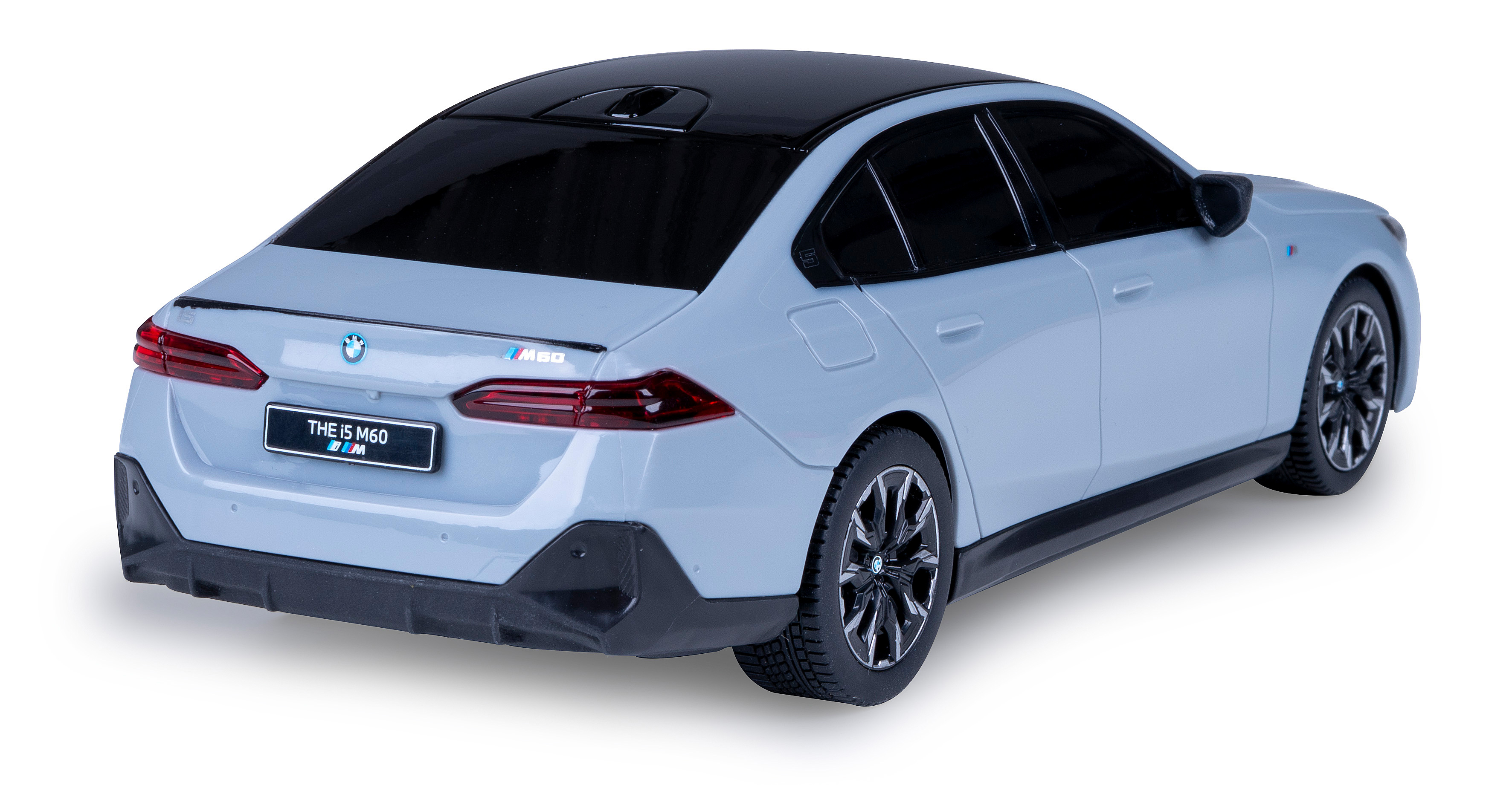 Rückansicht eines hellblauen BMW i5 M60 Spielzeugautos mit schwarzem Dach.