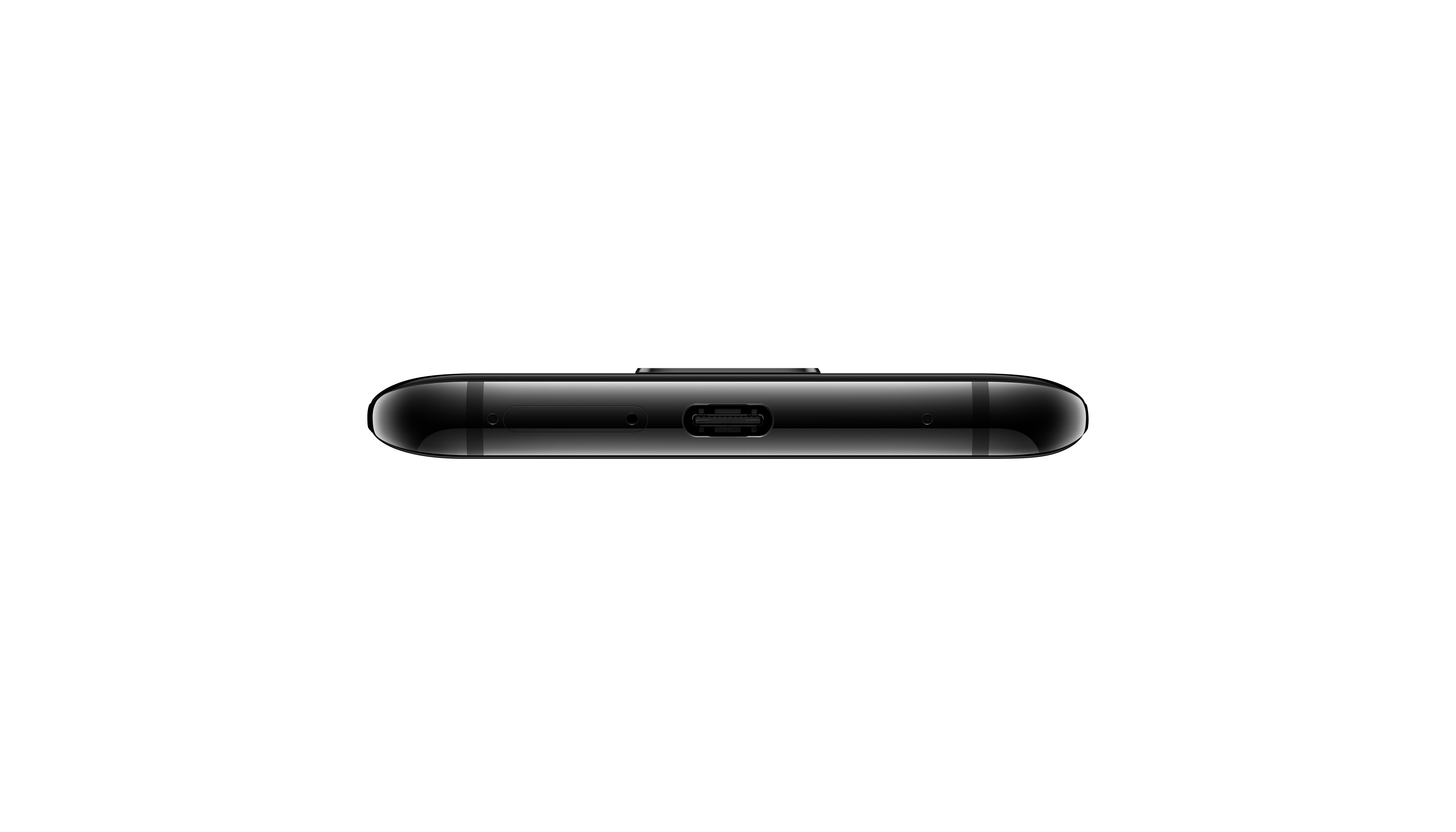 Draufsicht auf ein schwarzes Smartphone mit Ladeanschluss.