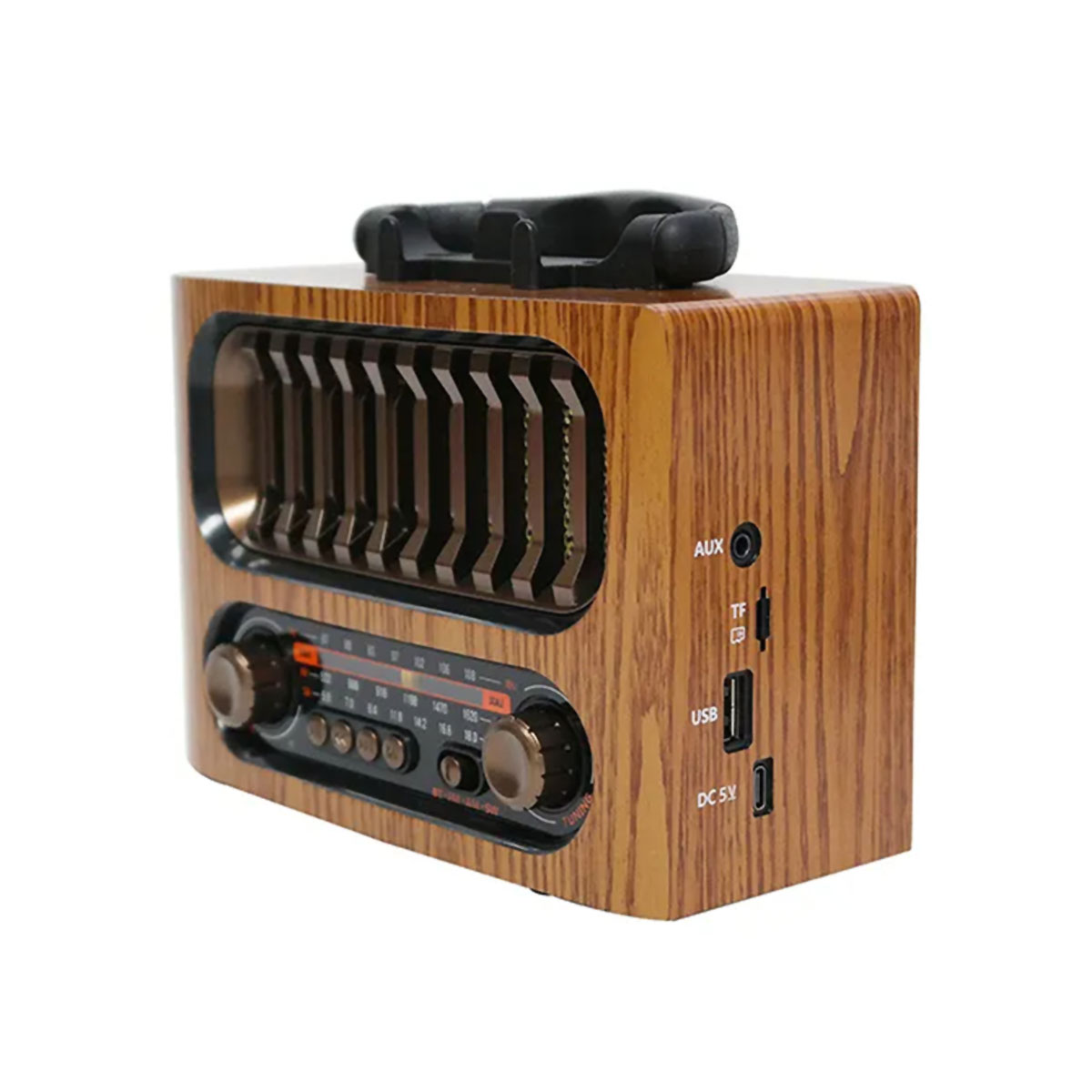 Radio de madera con asa y dos diales. Cuenta con puertos USB, AUX y DC 5V. Rejilla de altavoz negra.