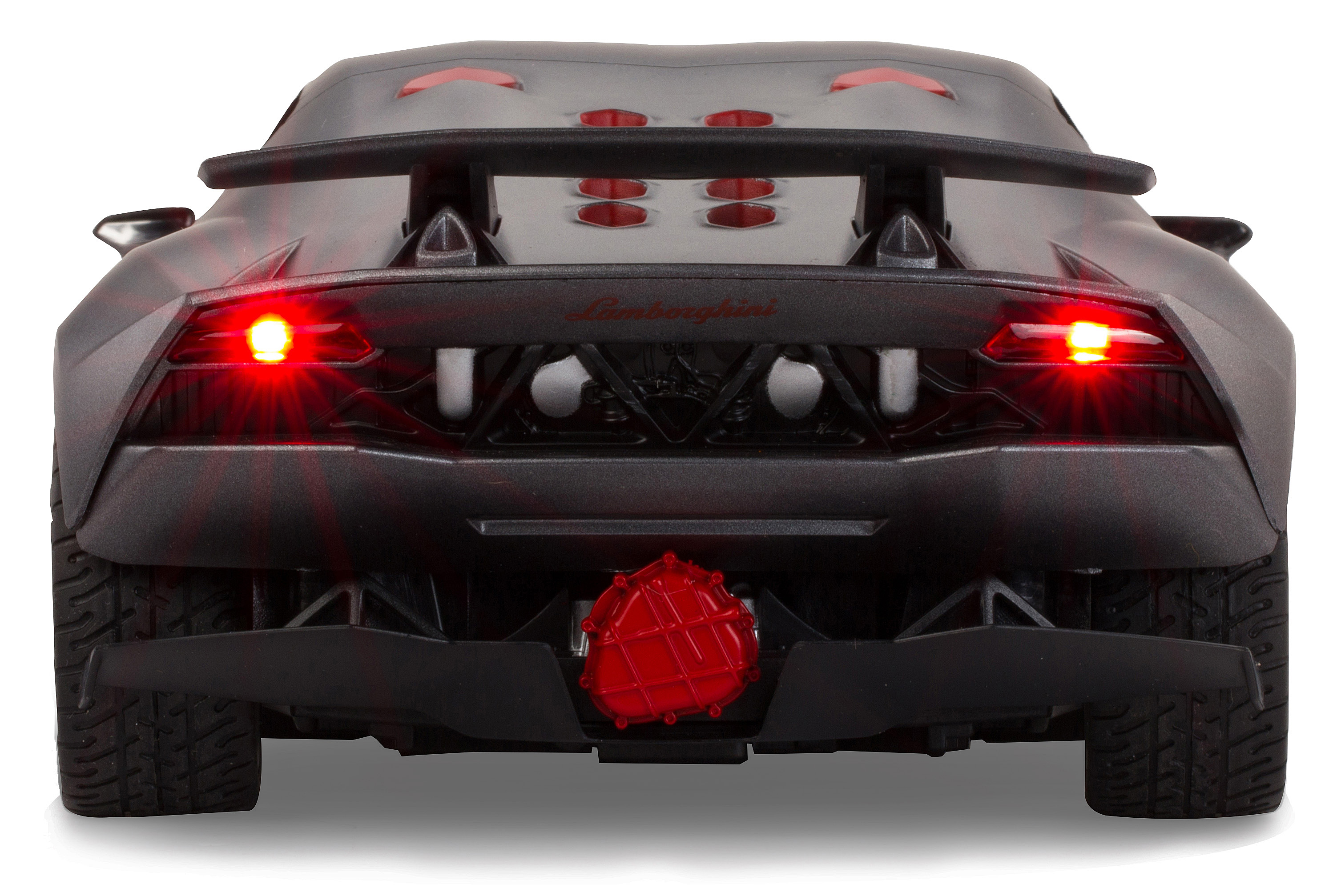 Rückansicht eines grauen Lamborghini-Spielzeugautos. Rote Bremslichter sind an. Logo ist sichtbar.
