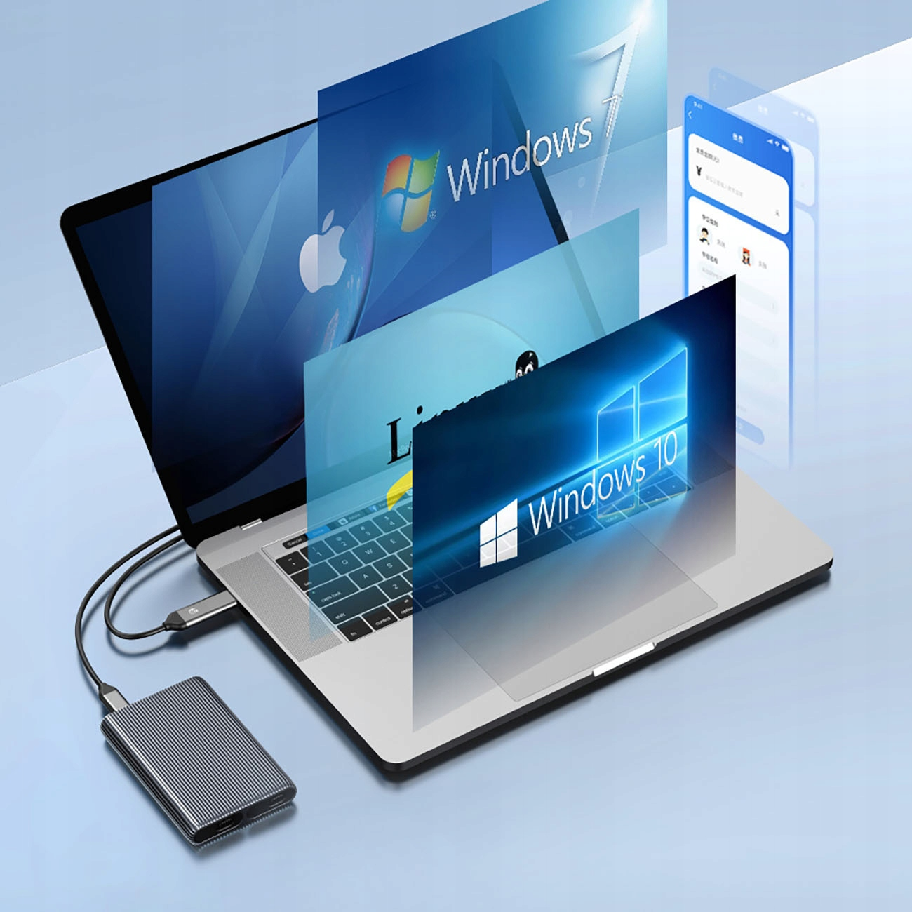 Laptop con schermi che mostrano Windows e un telefono. Disco rigido esterno argento collegato.
