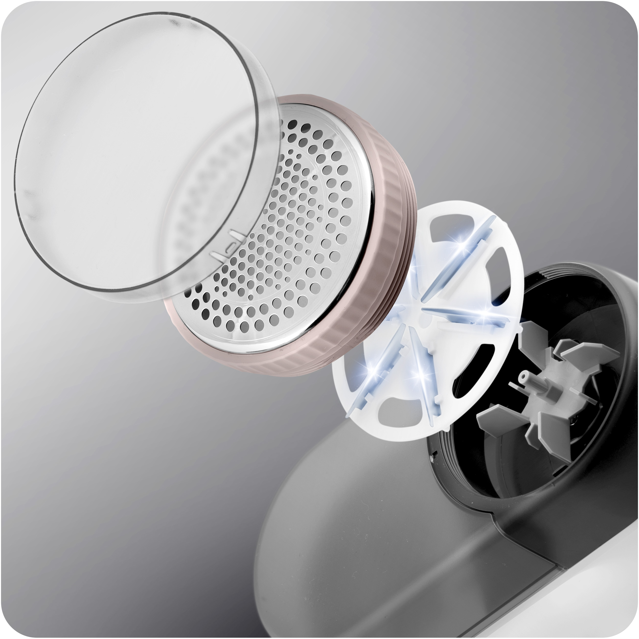 Widok rozłożony golarki do tkanin, pokazujący elementy: osłonę ostrza, zespół ostrza i obudowę.