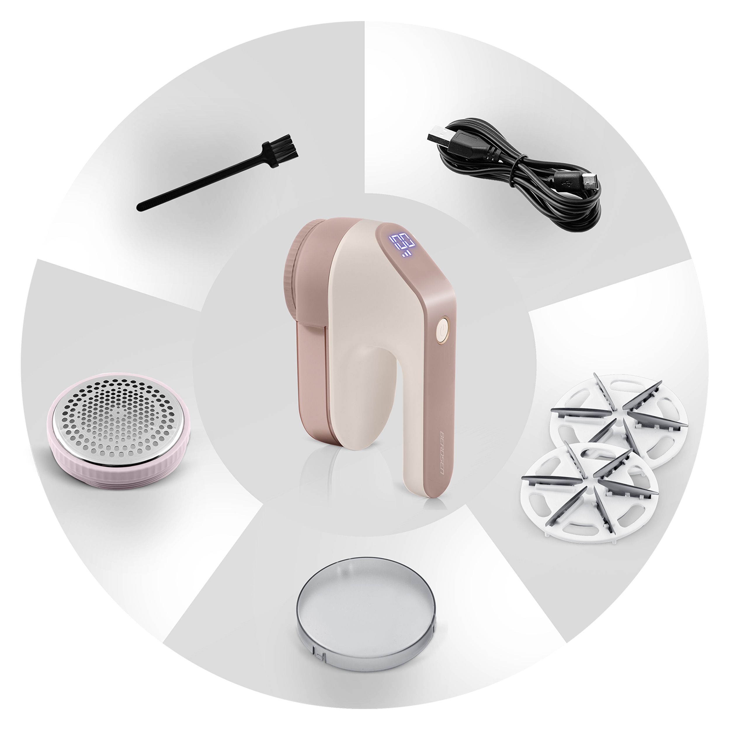 Golarka do tkanin z akcesoriami: szczotka, przewód zasilający, dodatkowe ostrze i plastikowy pierścień.