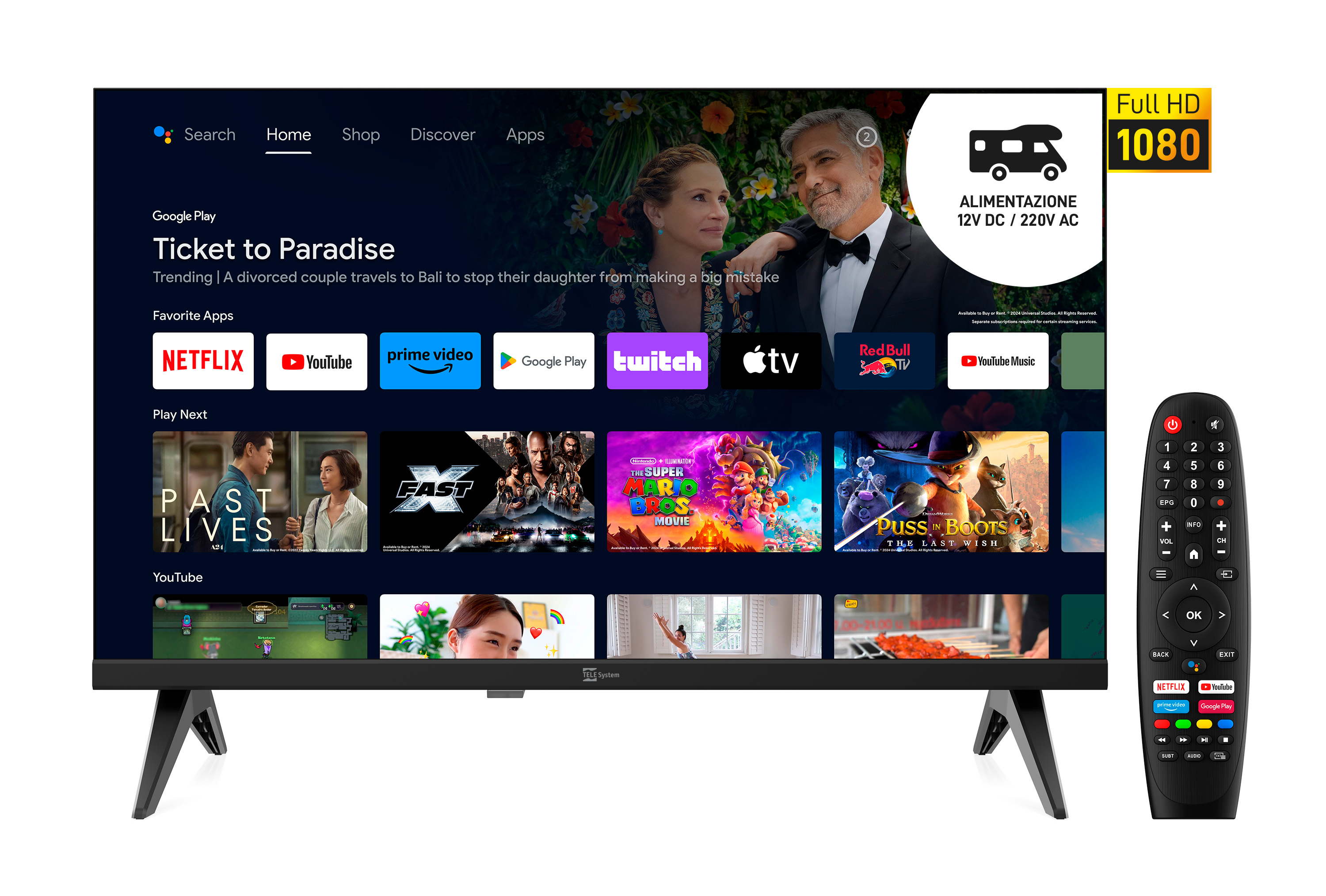 Telewizor pokazuje ekran z widokiem na miasto w nocy. Miasto ma światła. Niebo jest granatowe.