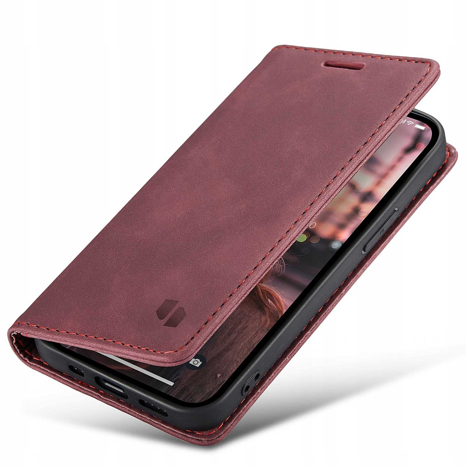 Bordowe etui z telefonem w środku, otwarte. Widoczne czerwone szwy wokół etui.