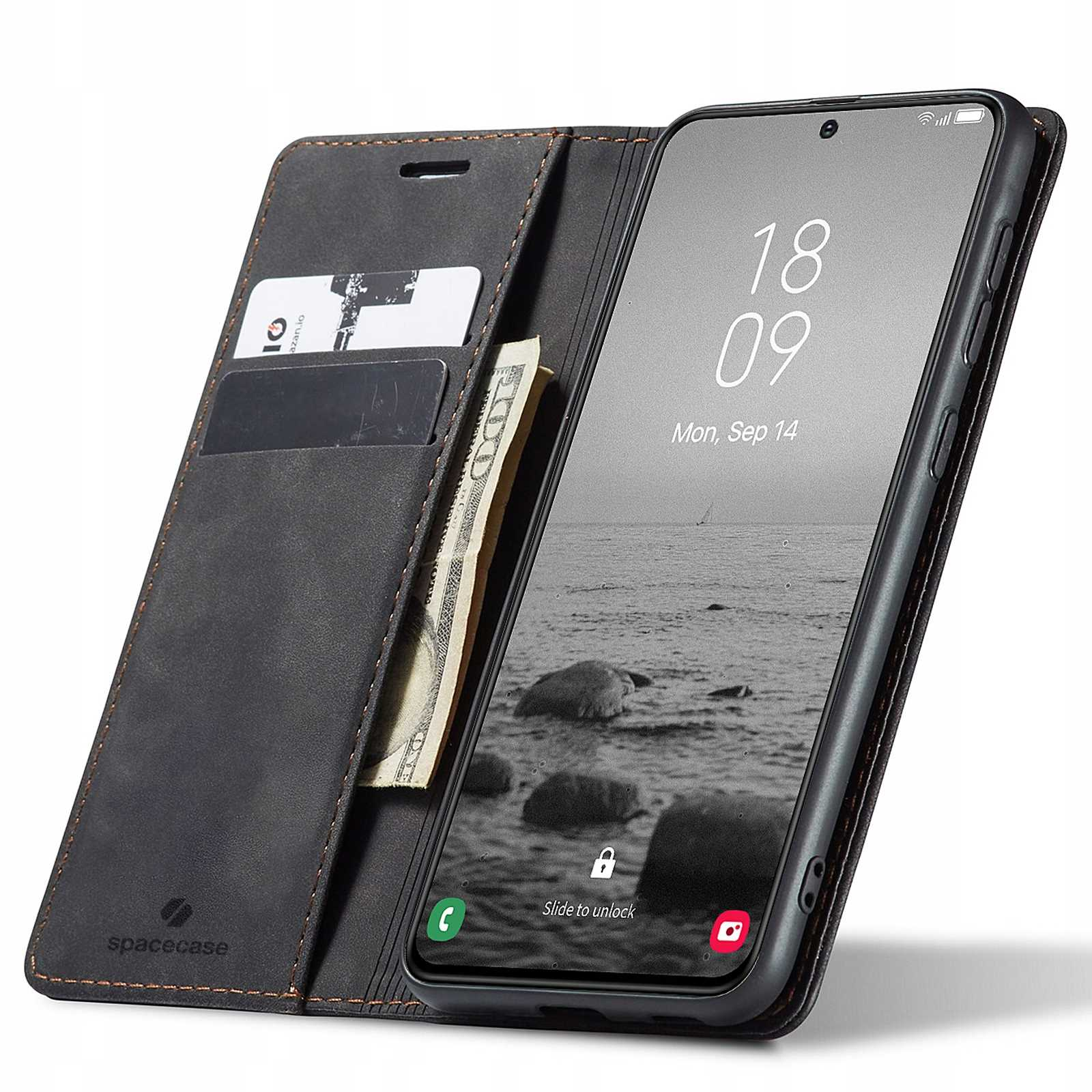 Otwarte czarne etui na telefon z telefonem, kartami i pieniędzmi w środku.