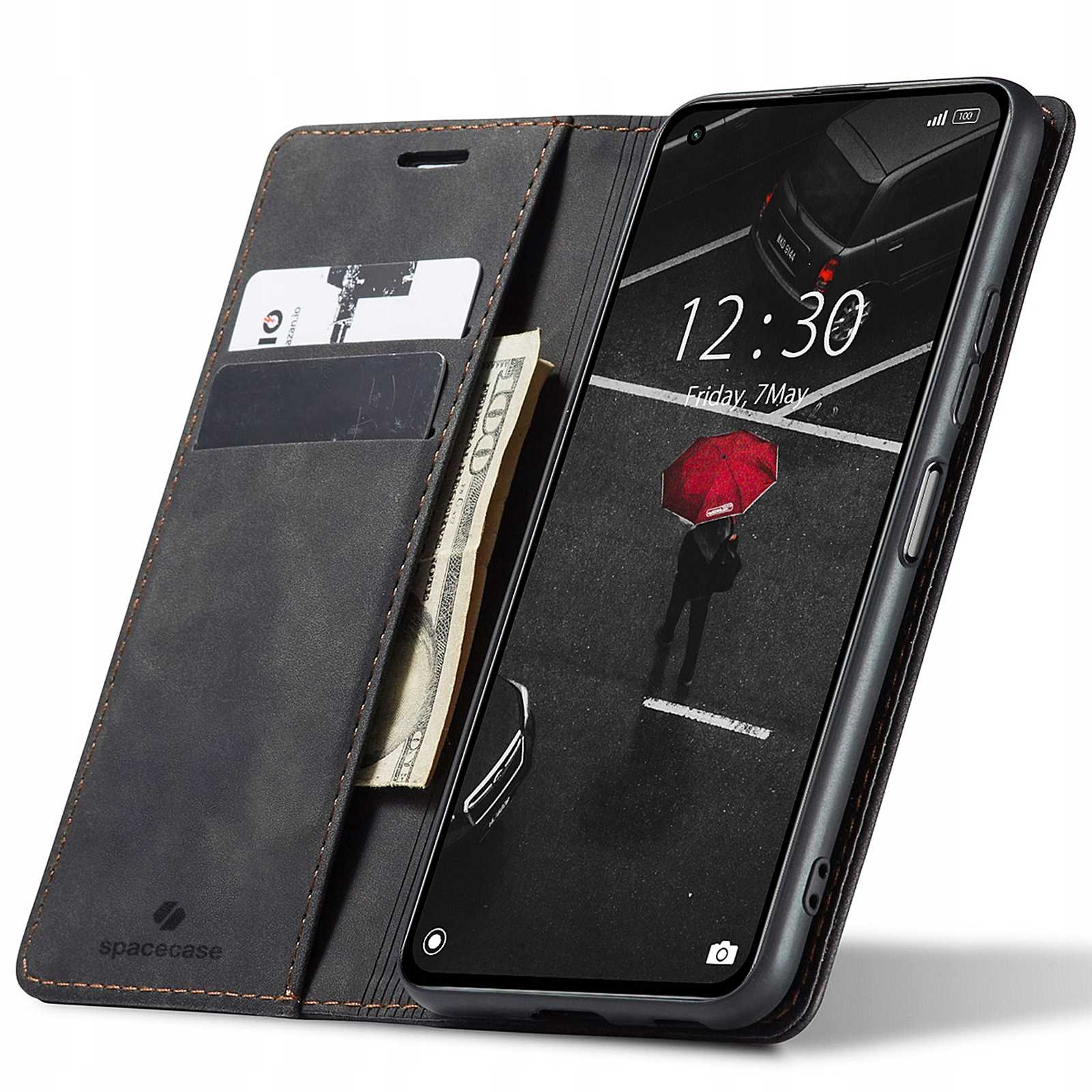 Otwarte, czarne etui na telefon pokazuje telefon z obrazem. Jest też portfel z kartami i gotówką.