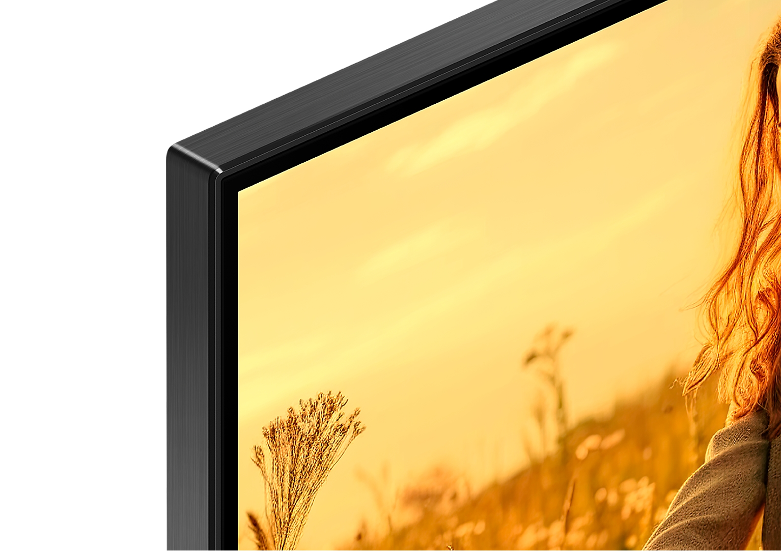 Zbliżenie rogu telewizora, pokazujące ramę i ekran.