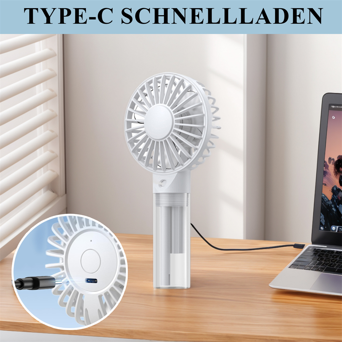 Weißer Handventilator mit Typ-C-Ladeanschluss. Er steht auf einem Holztisch mit einem Laptop.