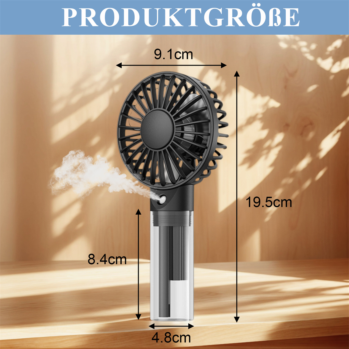 Schwarzer Handventilator mit Abmessungen. Ein Nebel sprüht aus dem Ventilator.