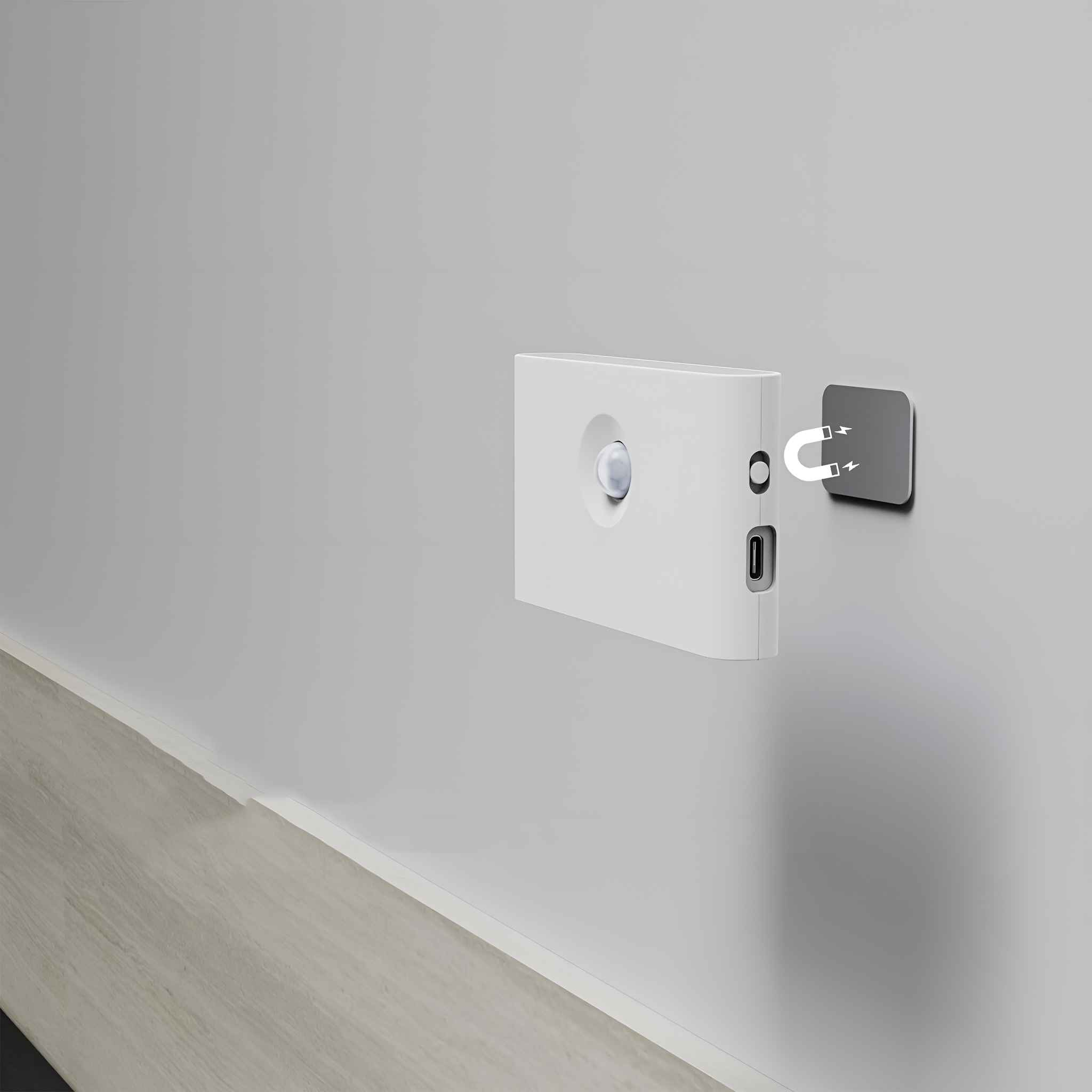 Ein weißes LED-Licht mit USB-Anschluss und Magnetfuß, an einer grauen Wand montiert.