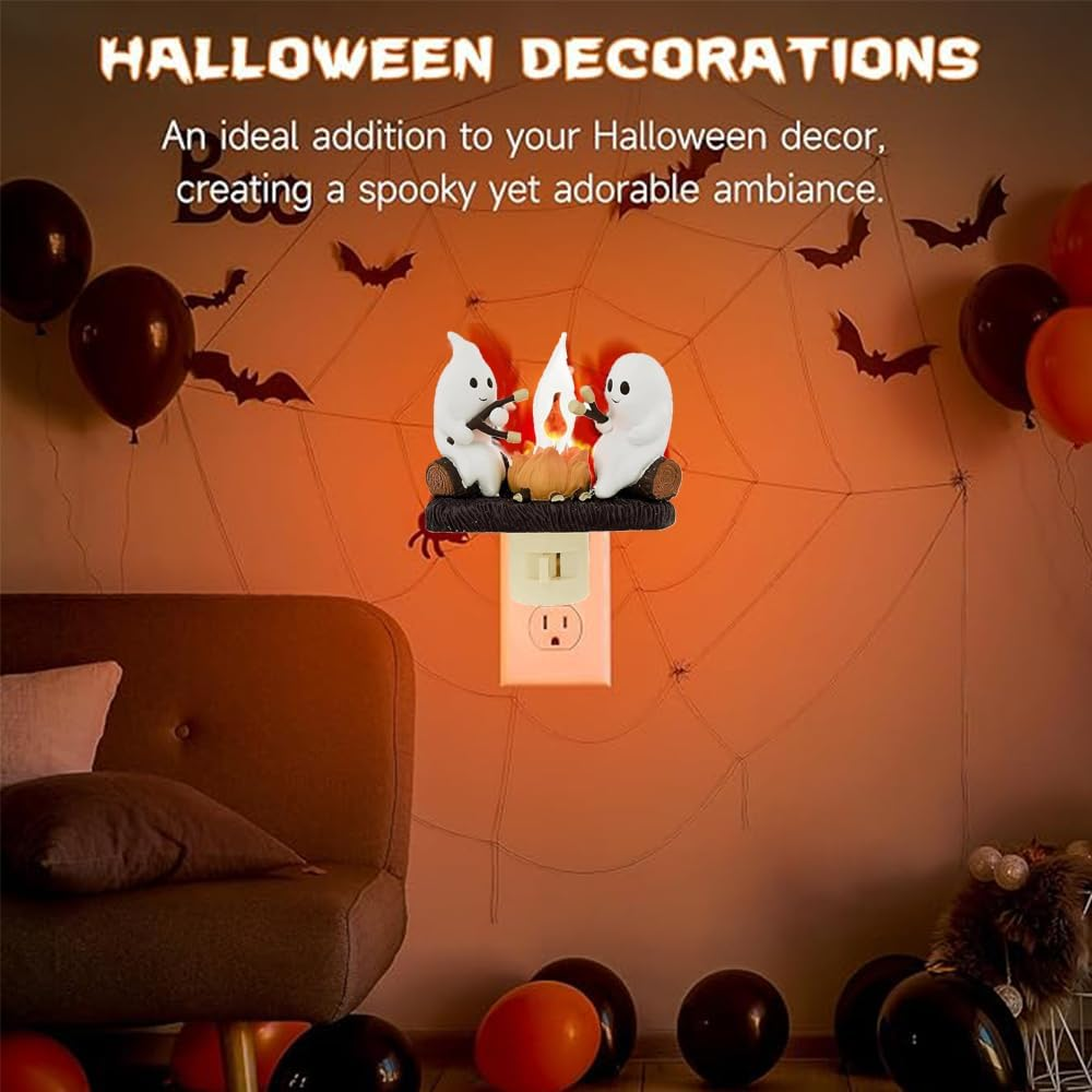 Halloween-Dekorationen mit einem Nachtlicht mit Geisterfiguren am Lagerfeuer.