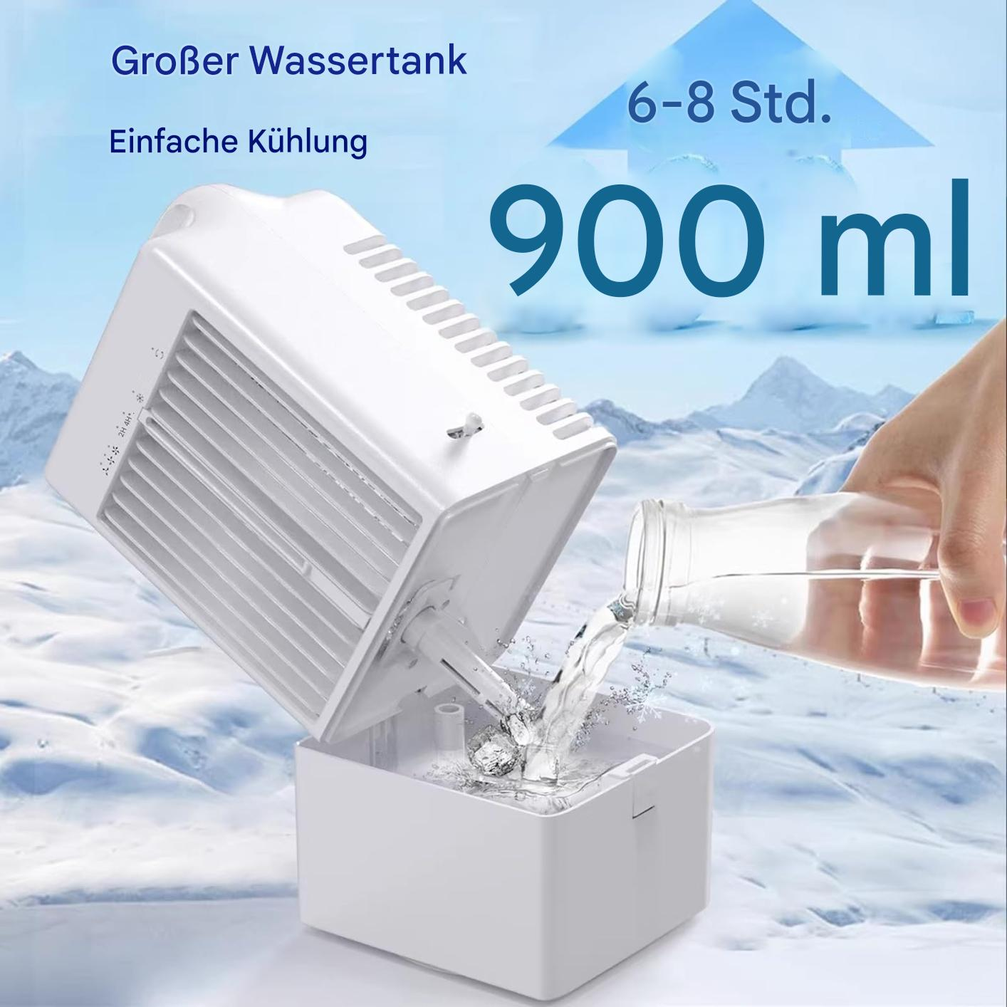 Ein weißer Luftkühler wird mit Wasser gefüllt. Der Text oben lautet 'Großer Wassertank'. Im Hintergrund sind schneebedeckte Berge zu sehen.