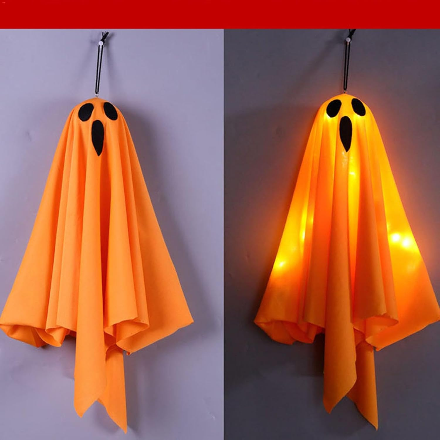 Eine orangefarbene Geisterdekoration mit schwarzen Augen und Mund hängt an einer grauen Wand.