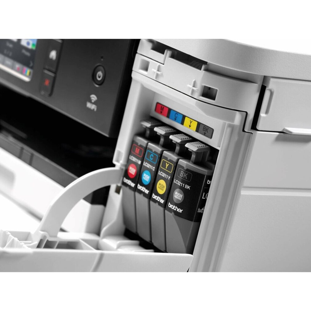 Drukarka z wieloma wkładami atramentowymi. Wkłady mają różne kolory.