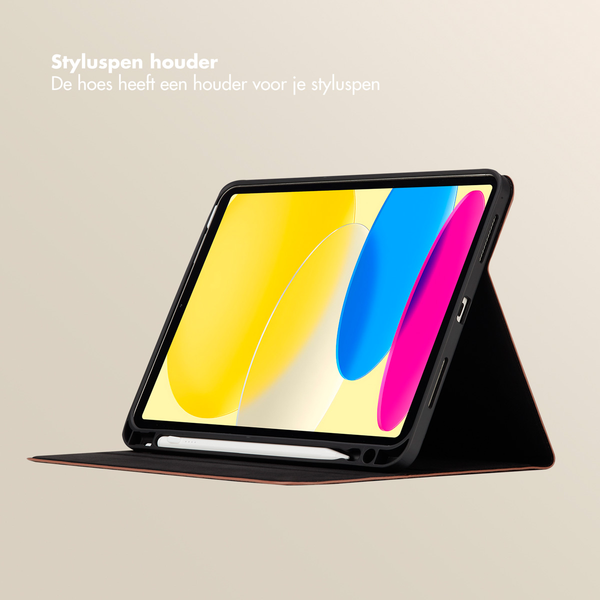 Tablet in black case with yellow, blue and pink abstract design on screen, white stylus on the side.