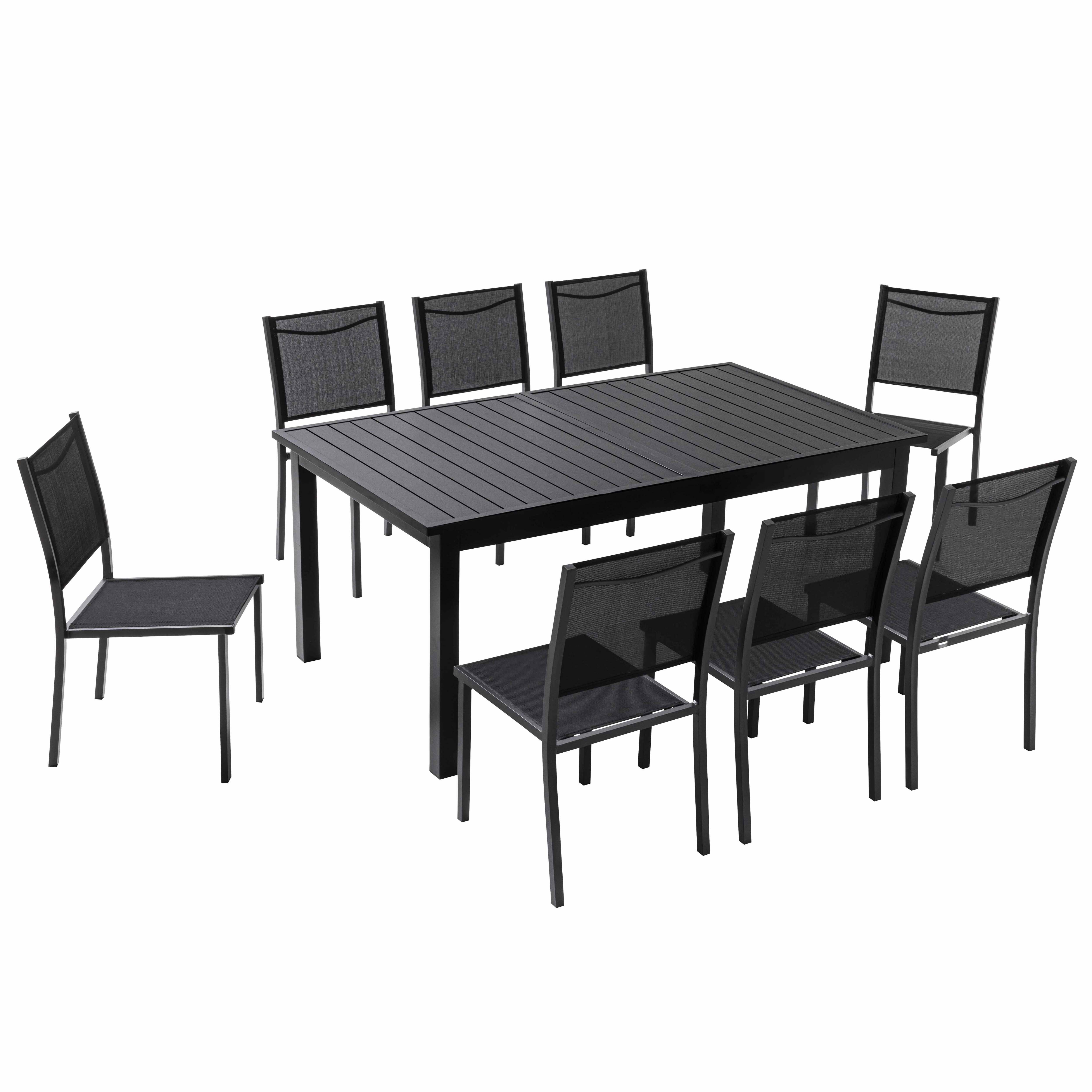 Ein schwarzer Tisch mit acht schwarzen Stühlen.