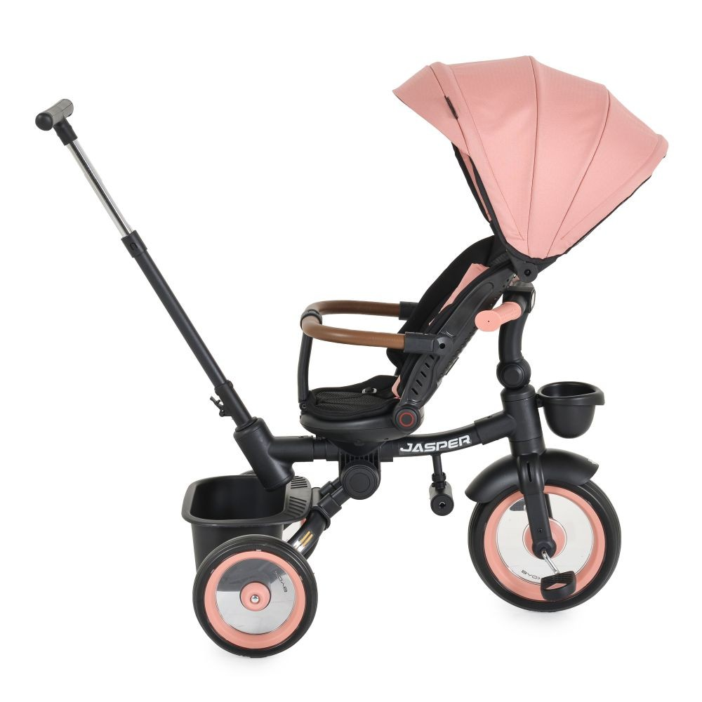 Ein rosa-schwarzes Dreirad mit Sonnenschutz. Es befindet sich auf weißem Hintergrund.