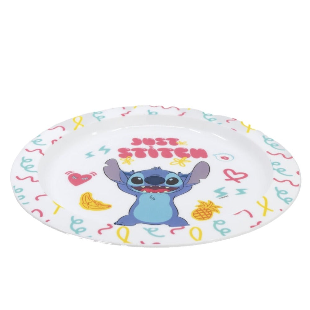 Piatto bianco con personaggio dei cartoni animati di Stitch, con disegni di banana, ananas e cuore.