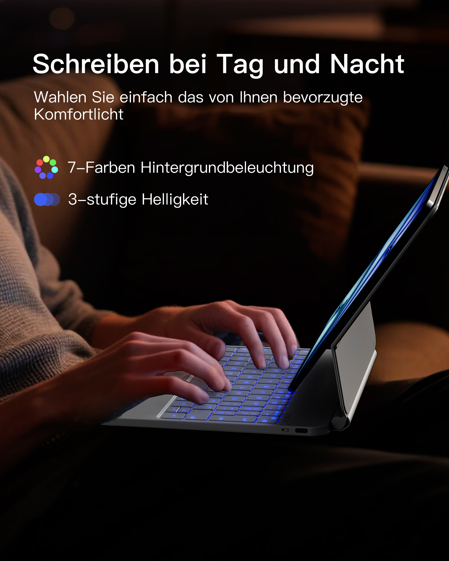 Eine Person, die nachts einen Laptop mit blau beleuchteten Tasten benutzt.
