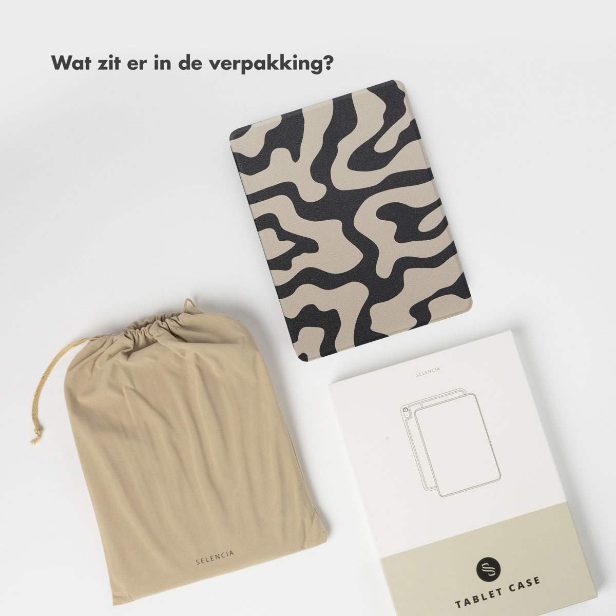 Tablet case, pouch, and box on a white surface. Zebra pattern on the case.